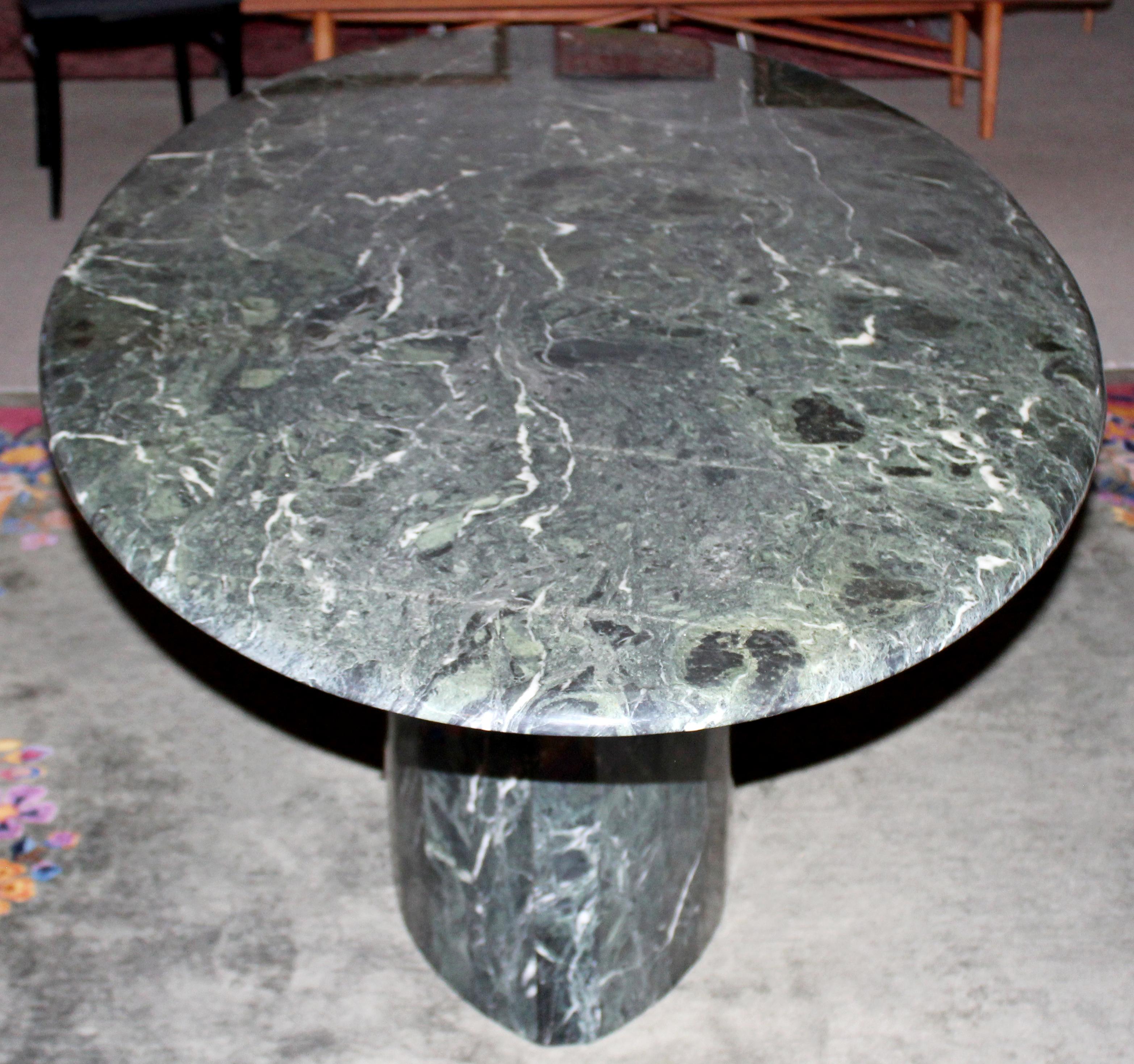 oval green marble dining table