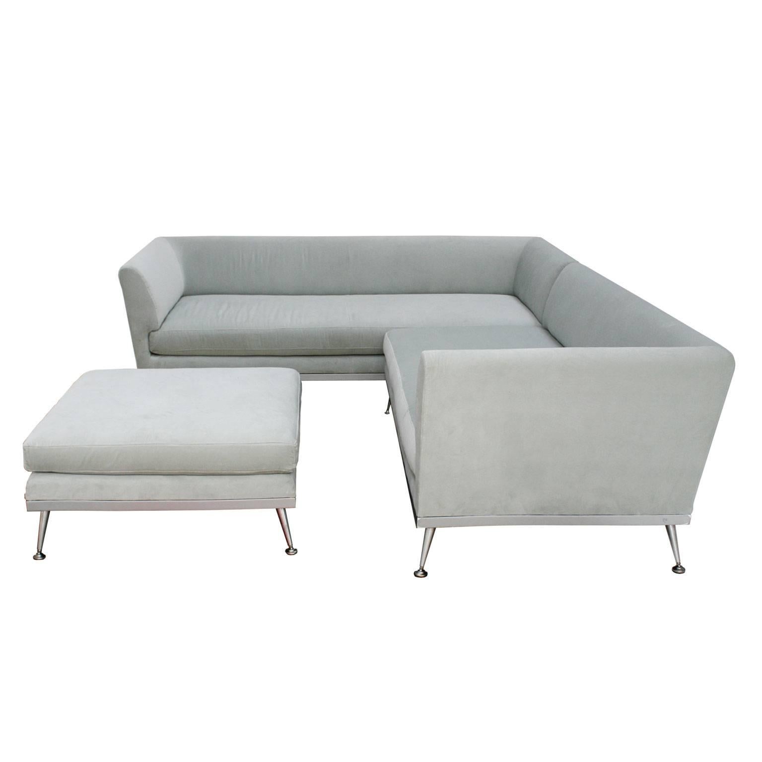Contemporary modern sectional Italian sofa. The set is composed of two independent sections in L-shape with different measurements (L 295 x D 90 x 40/70 (H) cm, L 215 x D 90 x 40/70 (H) cm) and square footstool of measurements L 85 x D 85 x 40 (H)
