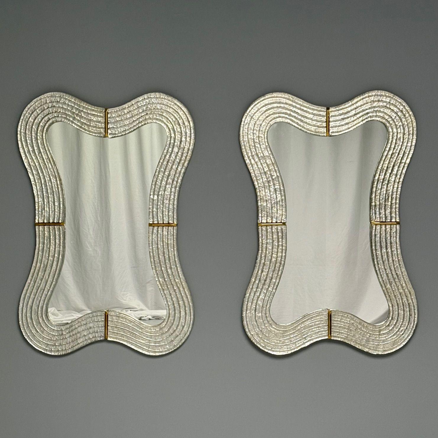 Contemporary, Modern Italian 'Wavy' Wall Mirrors, Murano Glass, Silver Leaf, Brass, Italy, 21st C.


This elegant pair of rectangular wall mirrors, handcrafted in a small workshop in Venice, Italy, showcases exquisite craftsmanship from the 21st