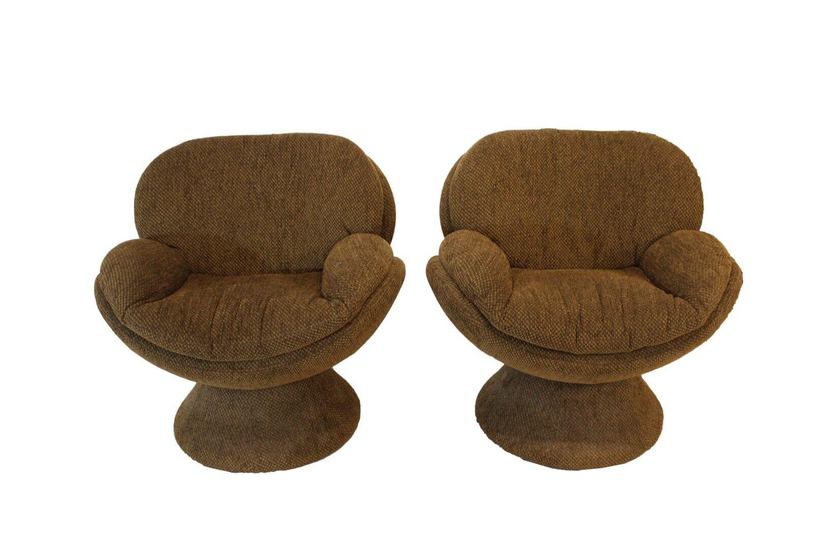 For your consideration is this contemporary modern pair of brown upholstered Jaymar swivel lounge arm chairs.

Dimensions: 34w x 31d x 33.5h Arm Height: 24