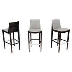 Sgabello moderno Kevin Stark per Hbf Carlyle in legno di frassino, set da 3