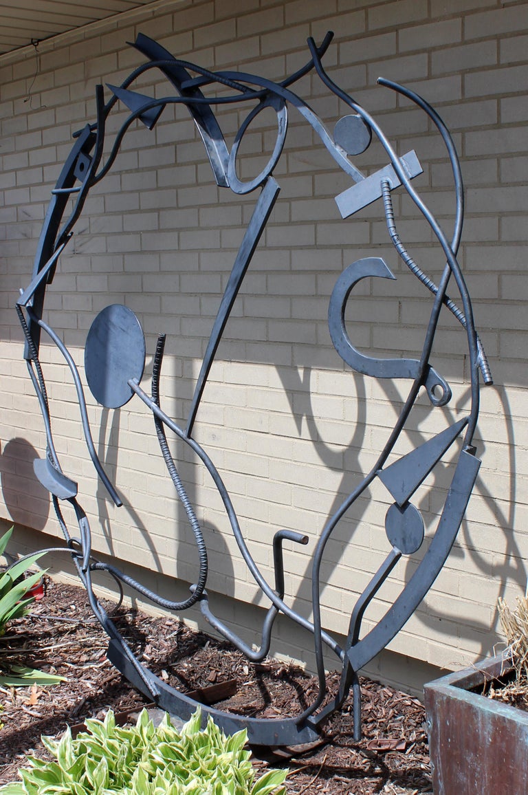 For your consideration is a thought provoking, abstract, massive black steel metal outdoor or indoor, floor sculpture, by artist Robert D. Hansen. In excellent condition. The dimensions are 78