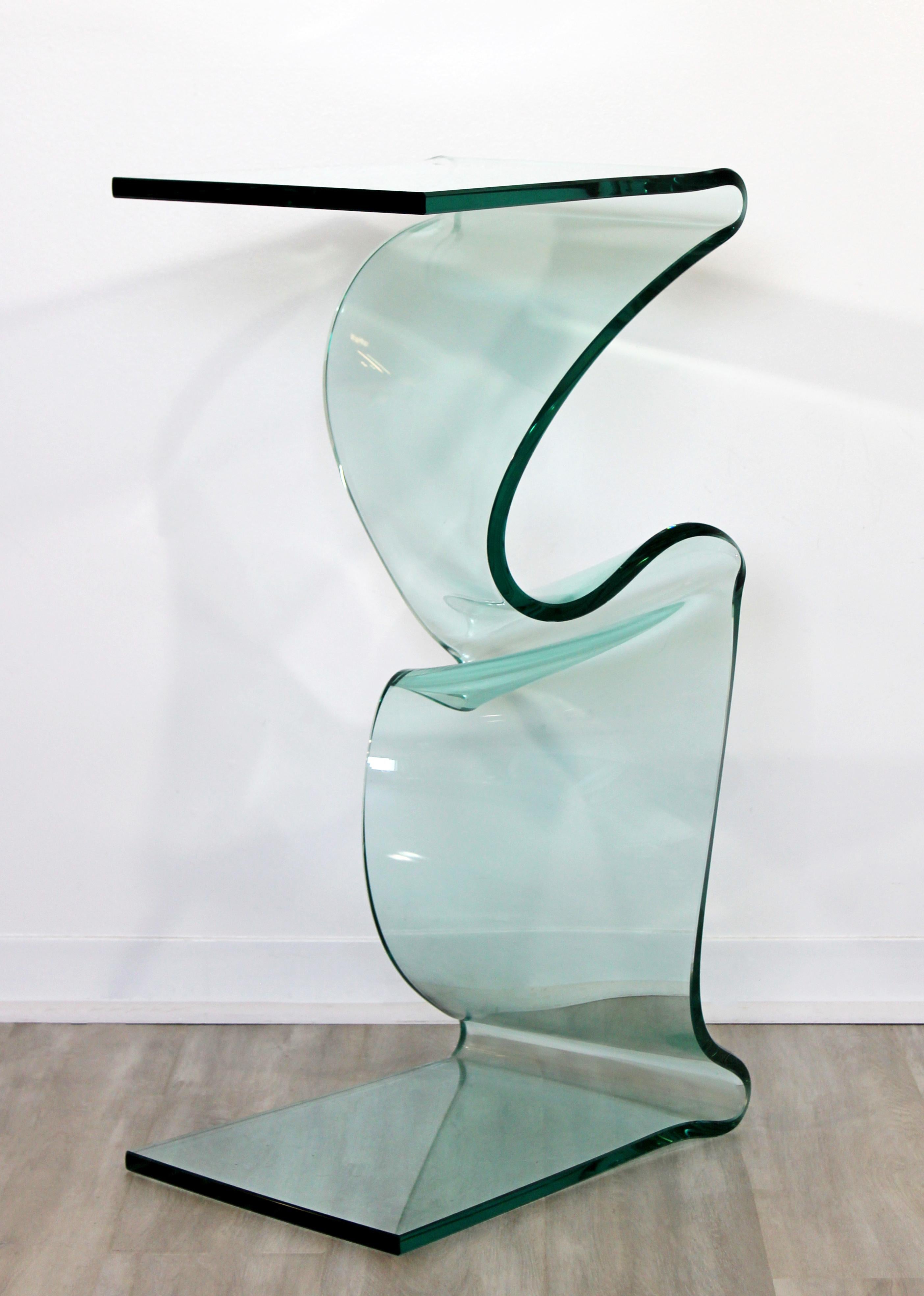 For your consideration is a stunningly unique, tall and asymmetrical, slump glass display pedestal, by Laurel Fyfe, circa 1980s. In excellent condition. The dimensions are 20