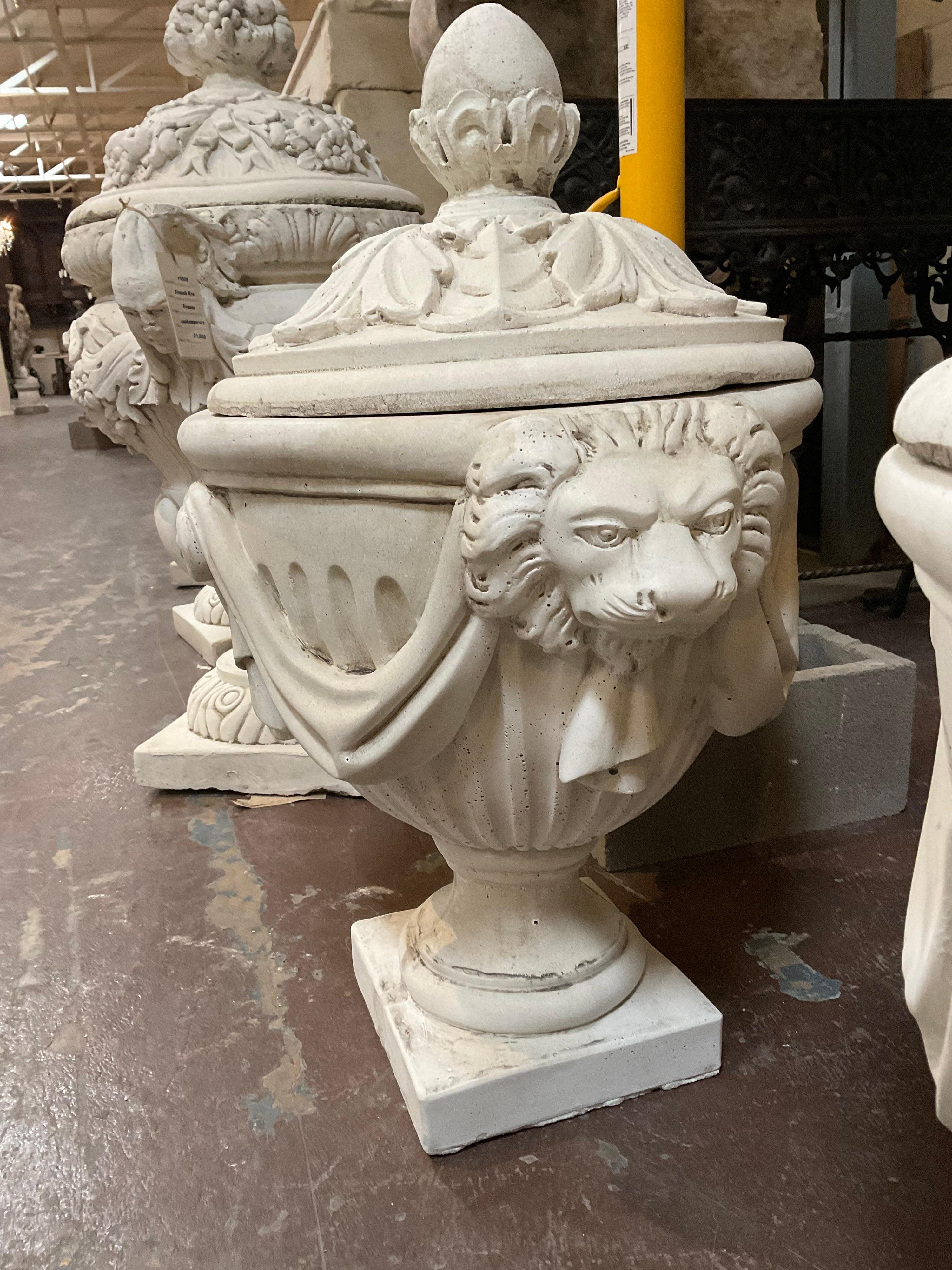 Impressive contemporary lion urn with lid included in purchase.