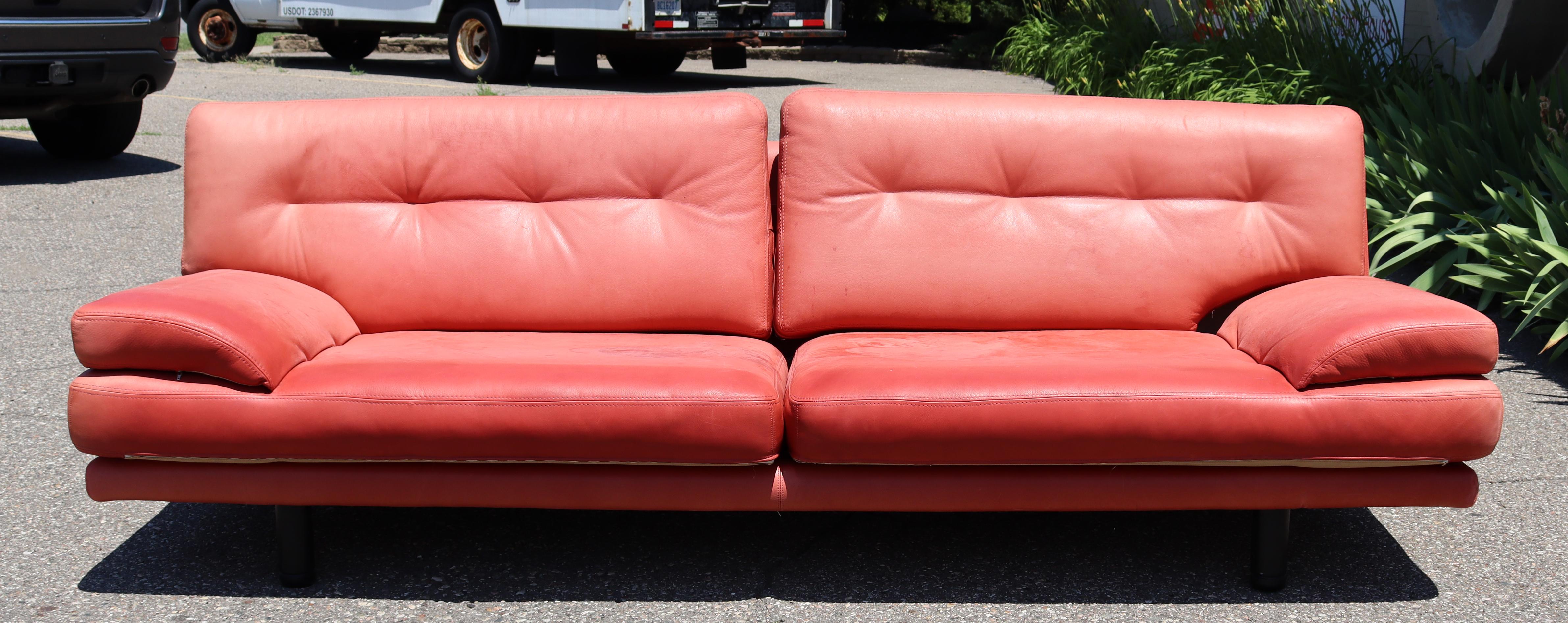 For your consideration is an original, low, two-seat sofa by Swedish company Dux. Needs to be recovered. The dimensions are 86