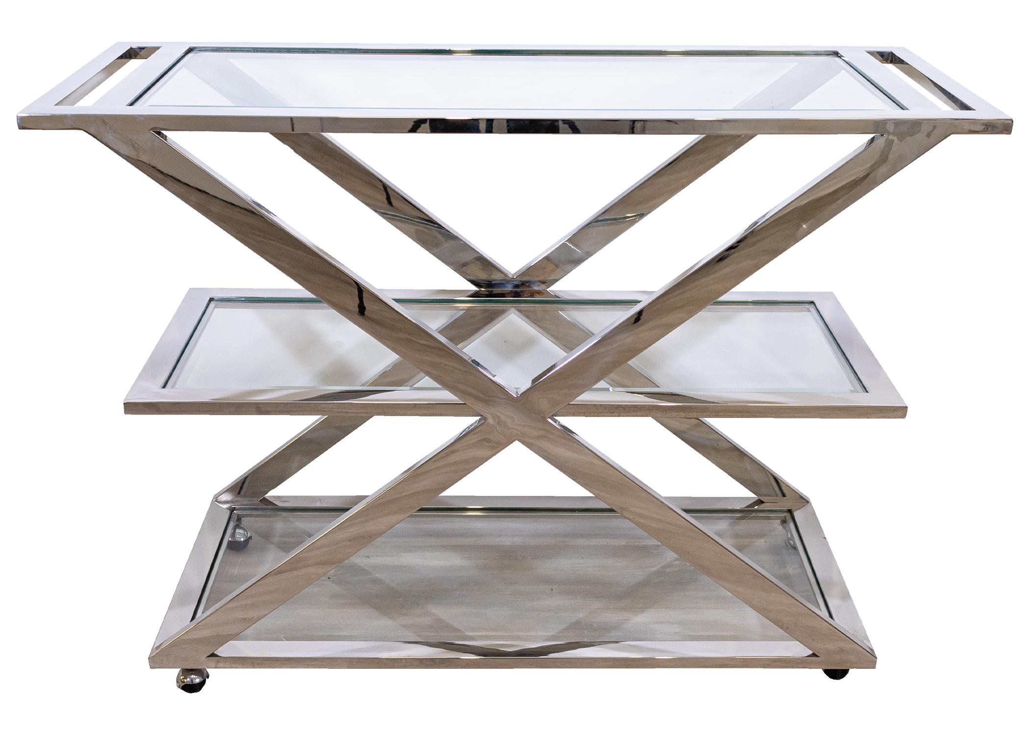 A 1980's 3 tier glass and chrome server bar cart. A marvelous bar cart to compliment any kitchen or dining room. This fabulous piece features 3 tiers of removable glass shelving. The glass is in great condition with minimal scratching. The frame of