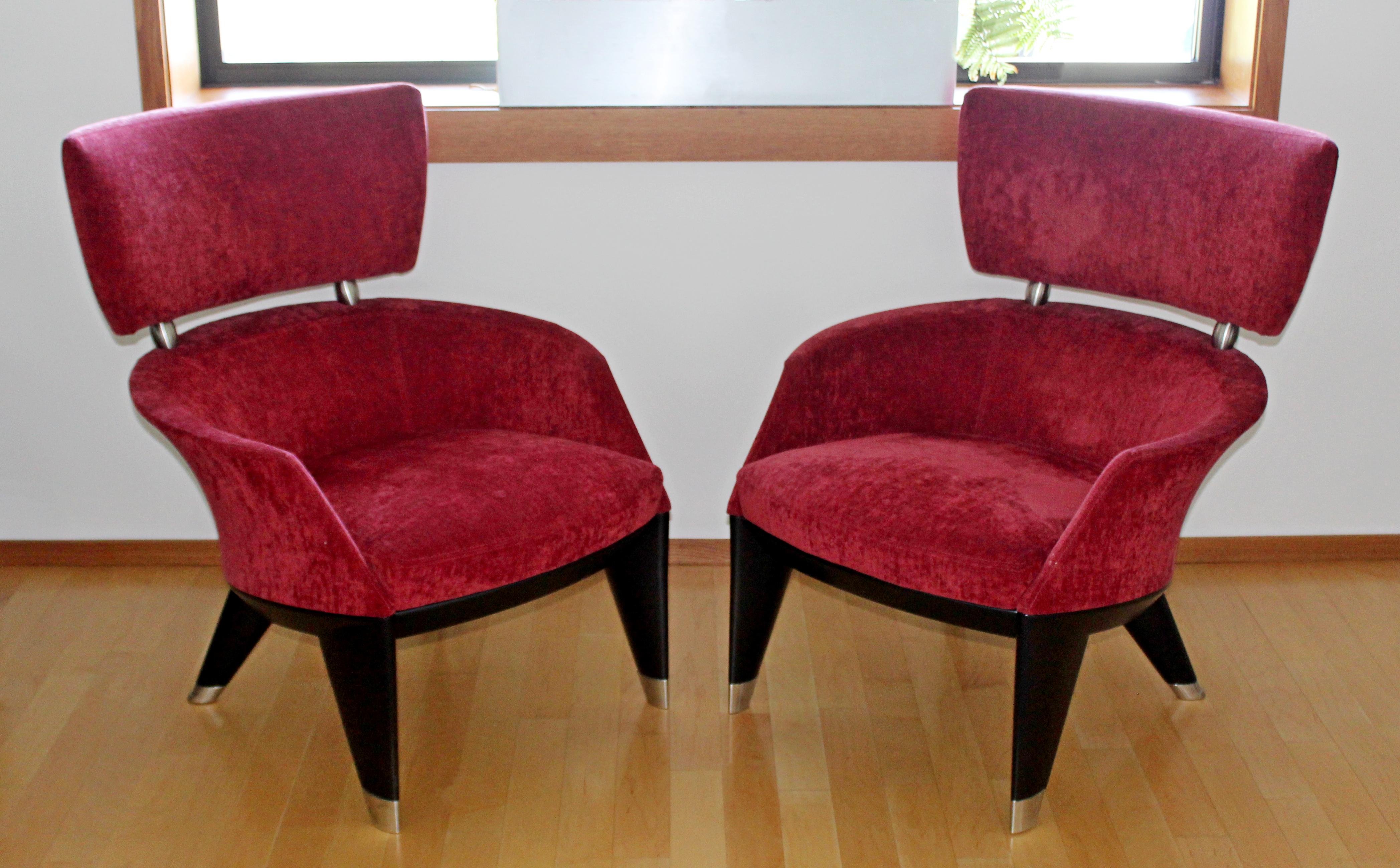 For your consideration is a magnificent pair of lounge armchairs, with rich red upholstery and on dark wooden bases, by Leon Krier for Italian company Giorgetti, circa 1990s. In great condition. The dimensions are 28