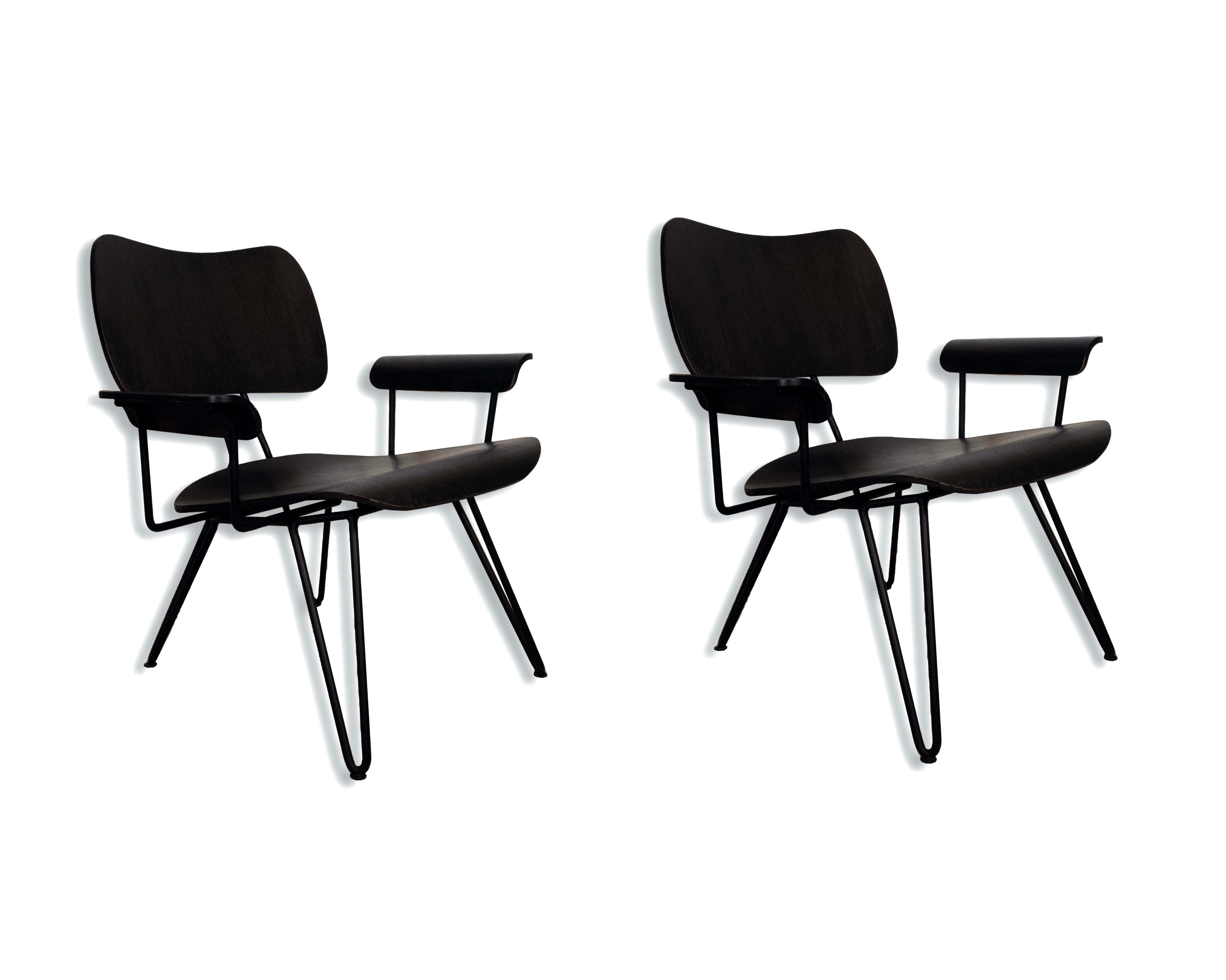 Le Shoppe Too presents this pair of beautifully designed lounge chairs by Diesel Creative Team for Moroso. Overdyed Reloaded is the term for these birch wood and black wrought iron chairs. In very good condition. Dimensions: 29