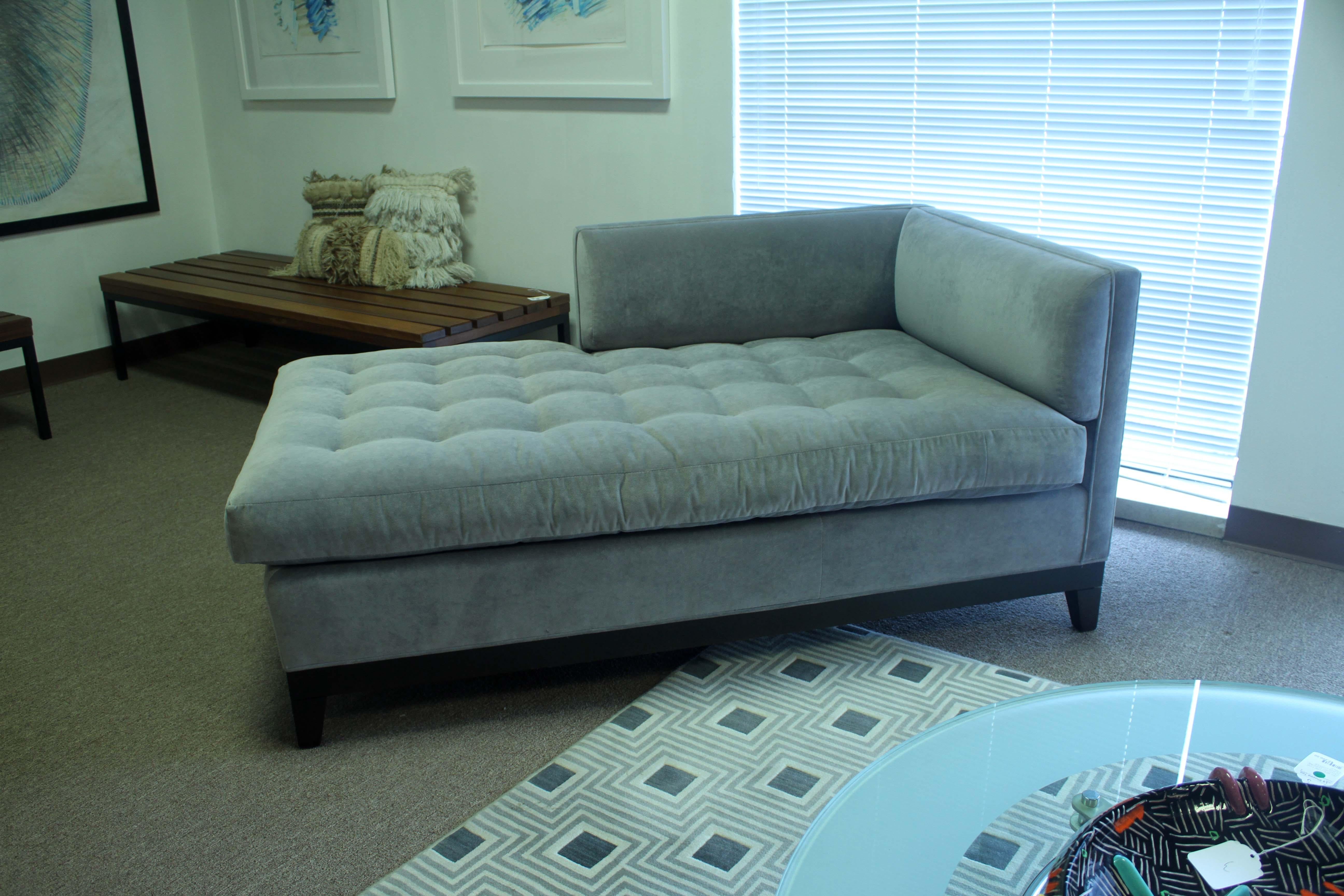 This Pearson grey tufted chaise is the perfect addition to any living room or bedroom. Its timeless grey upholstery adds a sophisticated touch to any room, while its tufted design brings an elegant and timeless look. Its plush cushioning provides