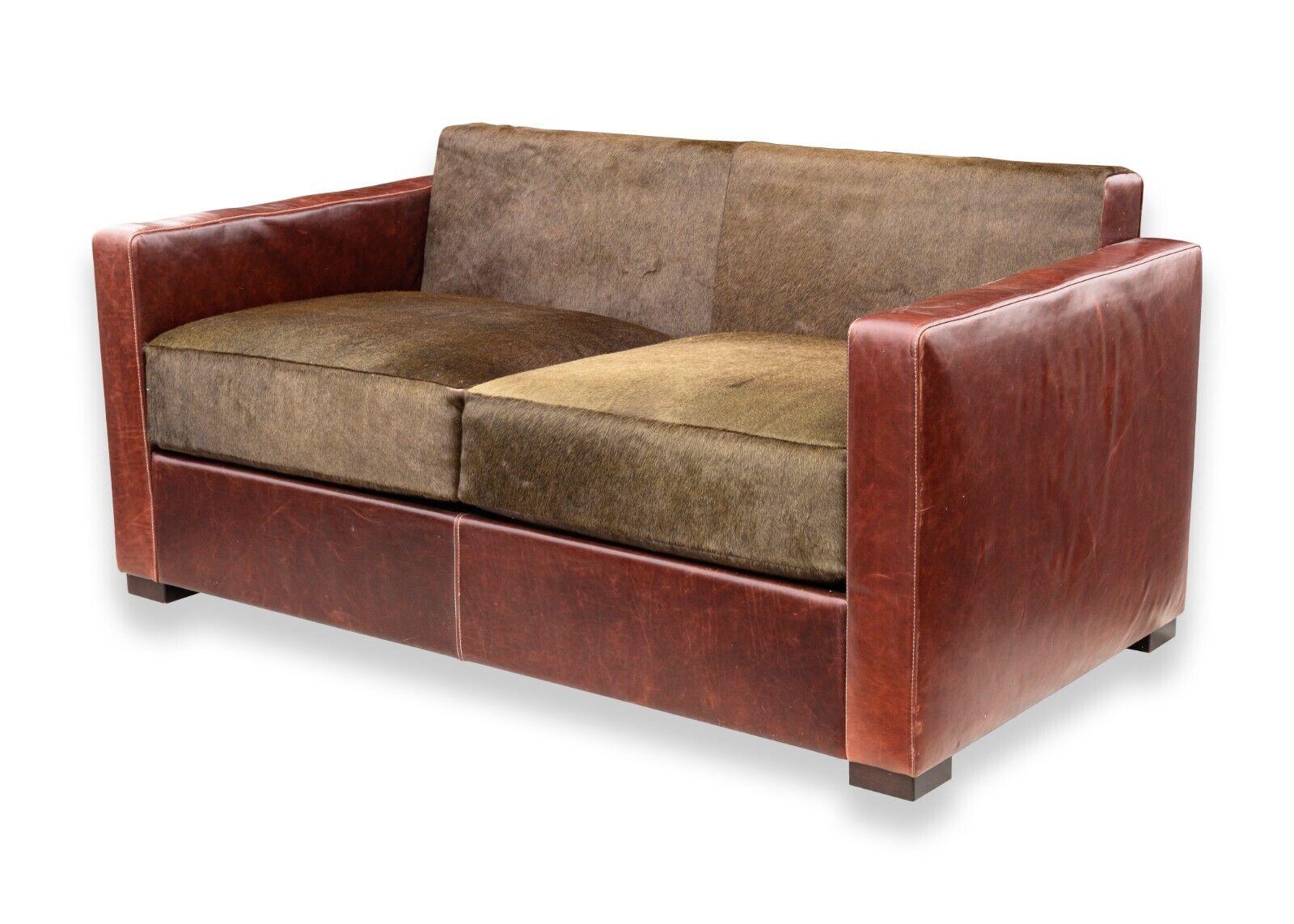 A Poltrona Frau Peter Marino Linea A leather and hide sofa. This gorgeous and unique sofa is from Italian furniture company Poltrona Frau, designed by Peter Marino. This sofa is a part of their line 