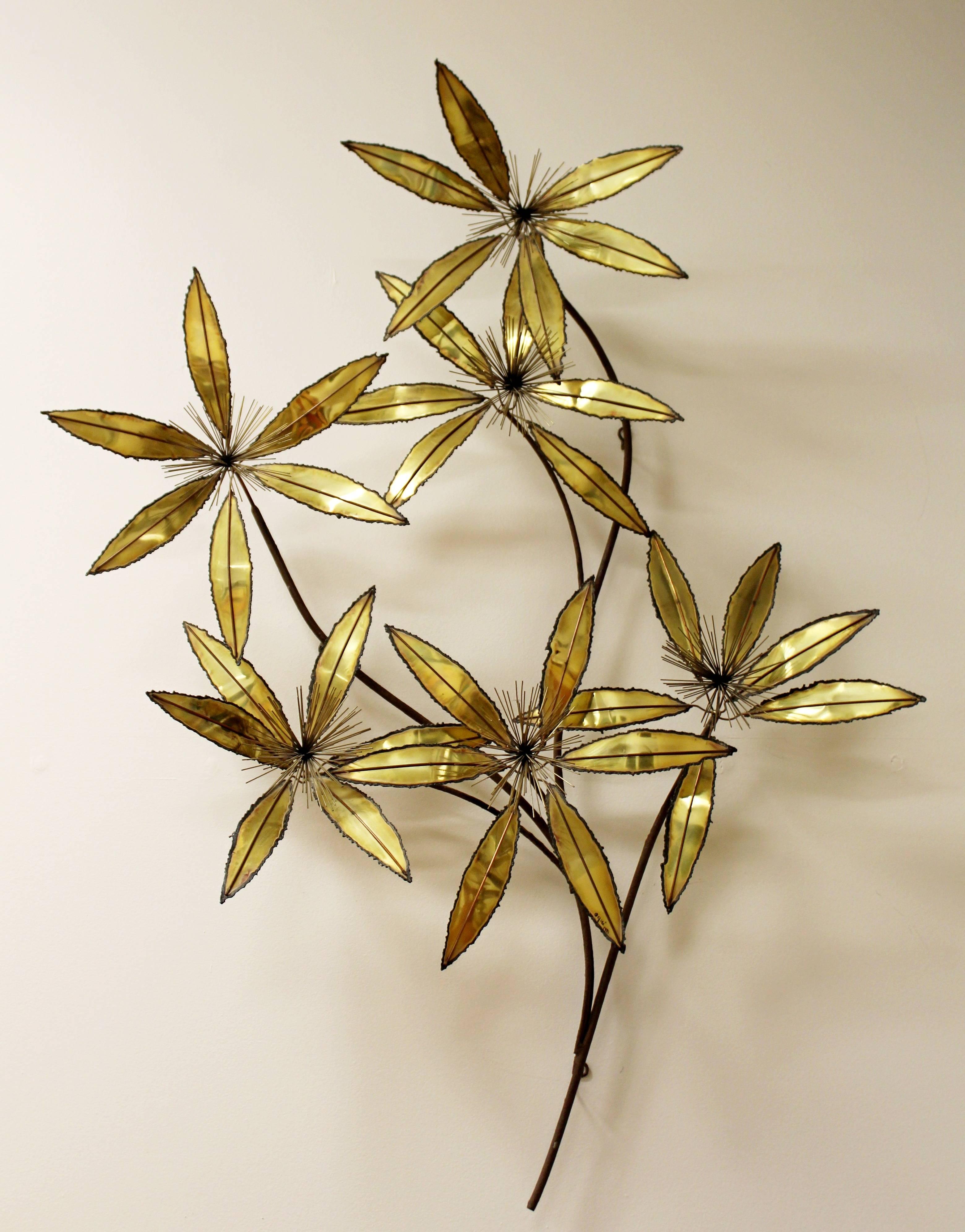 For your consideration is a brilliant, brass wall sculpture of flowers, signed Curtis Jere, dated 1981. In excellent condition. The dimensions are 42