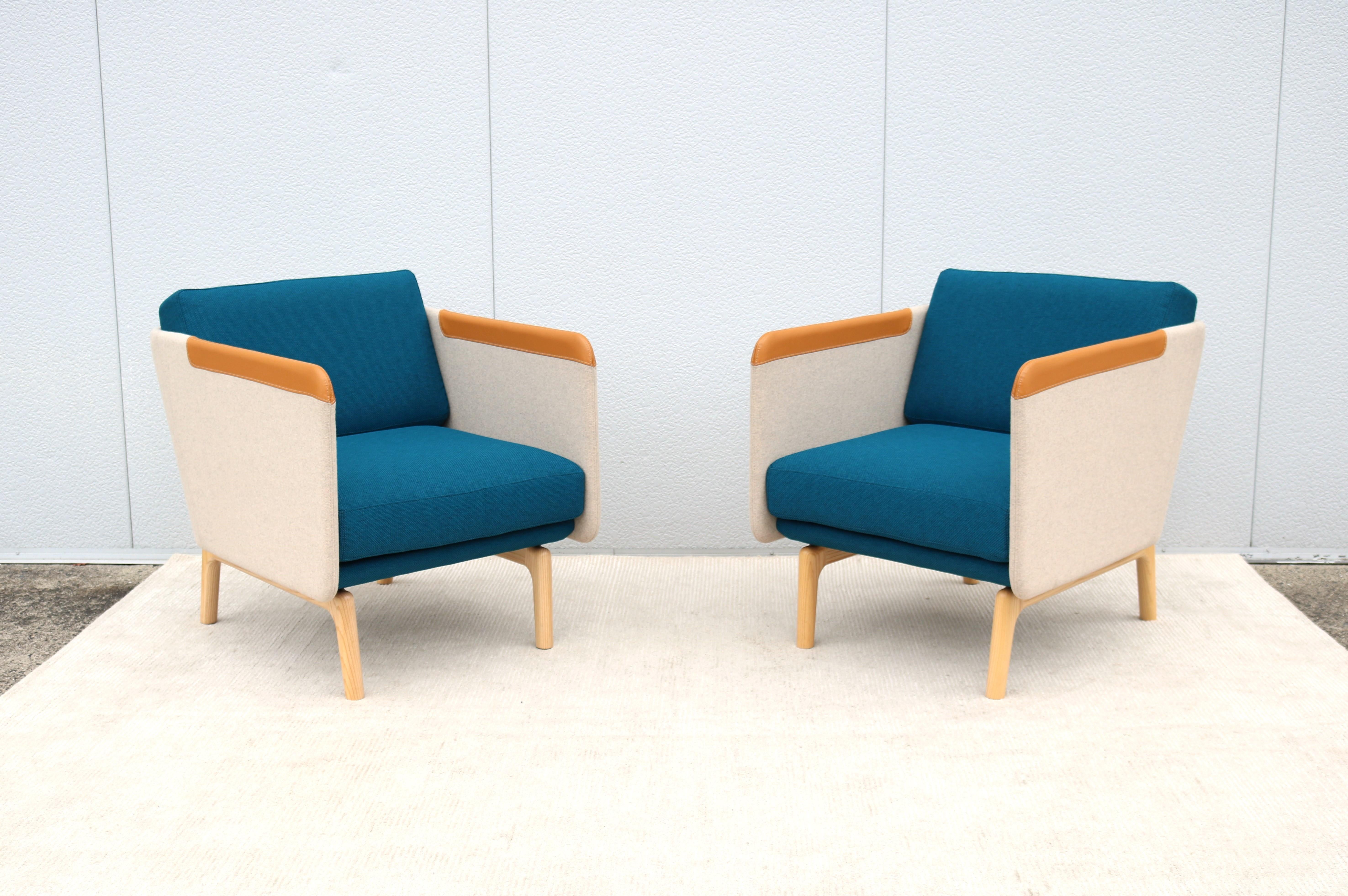 Add a touch of sophistication to your home or office with this fabulous pair of Heya lounge chairs.
Designed by Roger Webb for OFS to be comfortable and supportive. In Japanese, Heya means (small room) 
These chairs are made of high-quality