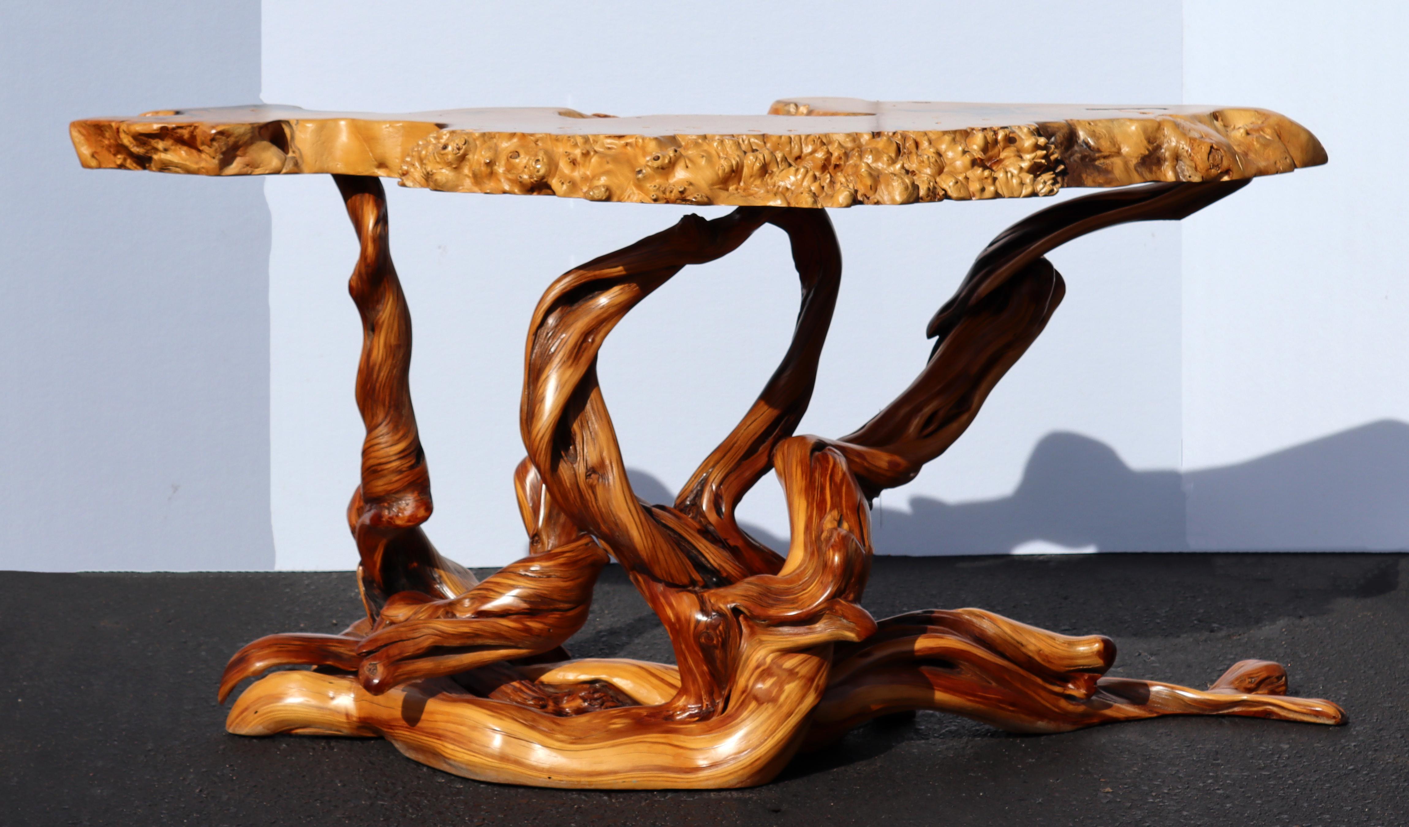 For your consideration is an incredible, root wood console table, with a glass top, circa the 1990s. In excellent condition. The dimensions are 62
