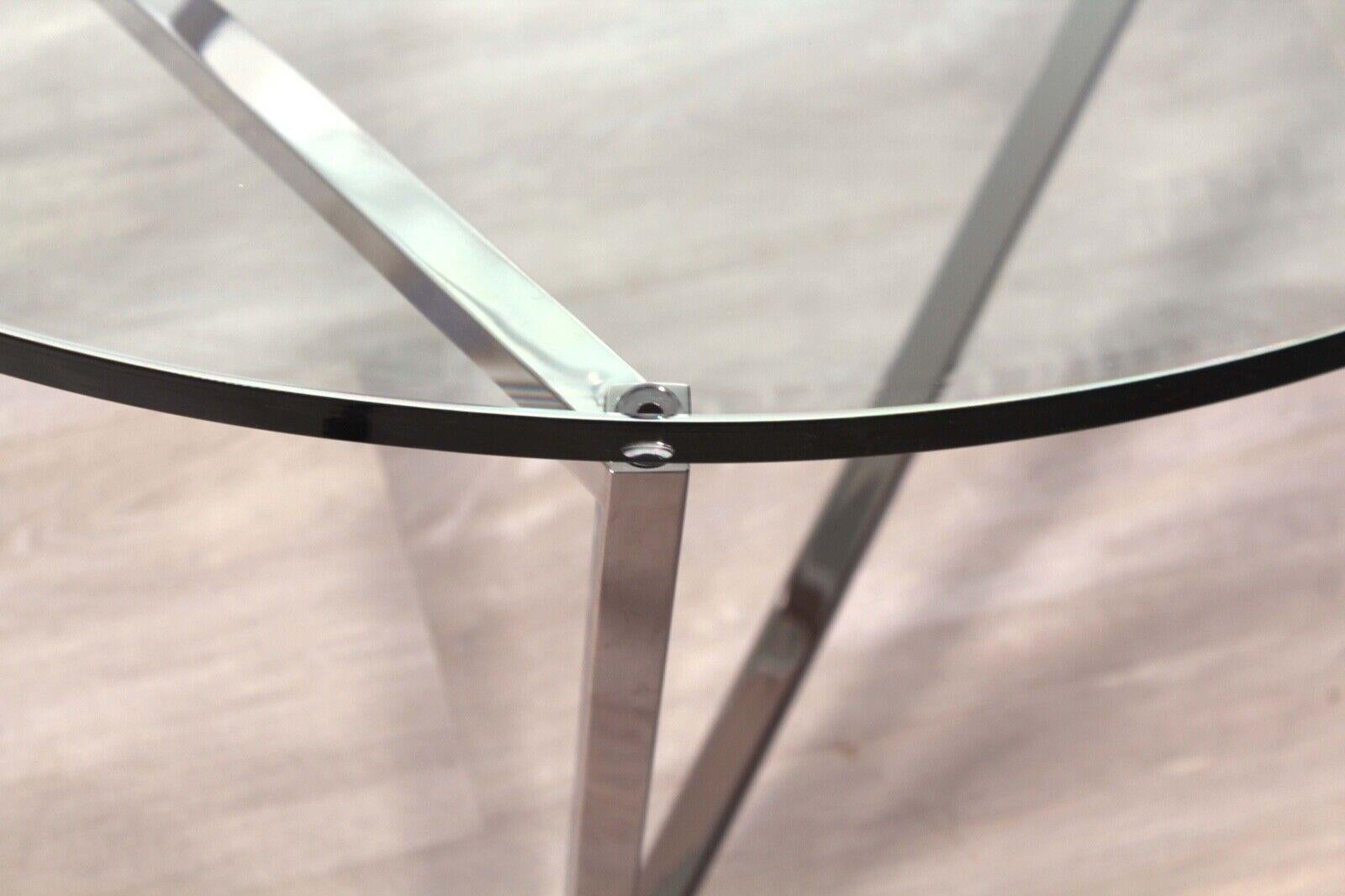 Table basse ronde moderne contemporaine en verre poli en acier inoxydable Brueton 1