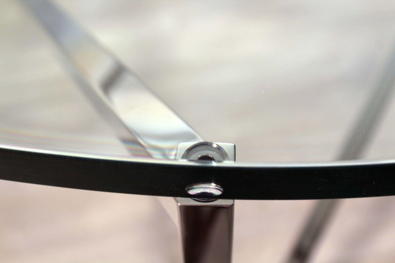 Table basse ronde moderne contemporaine en verre poli en acier inoxydable Brueton 2