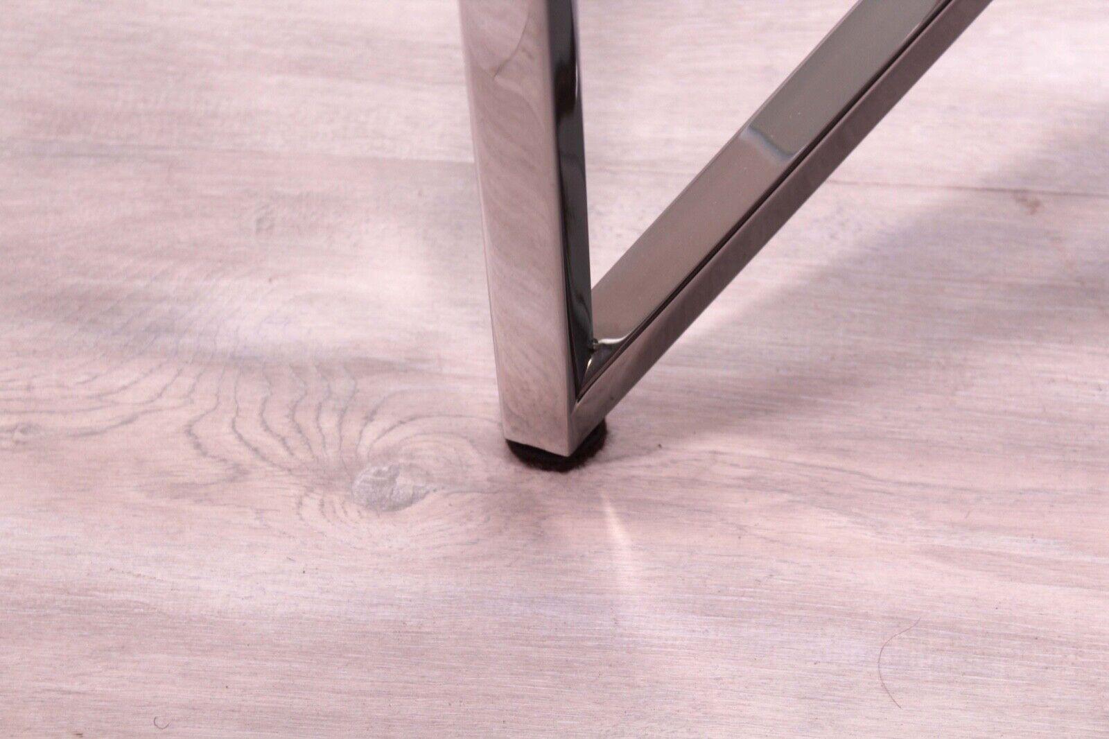 Table basse ronde moderne contemporaine en verre poli en acier inoxydable Brueton 3