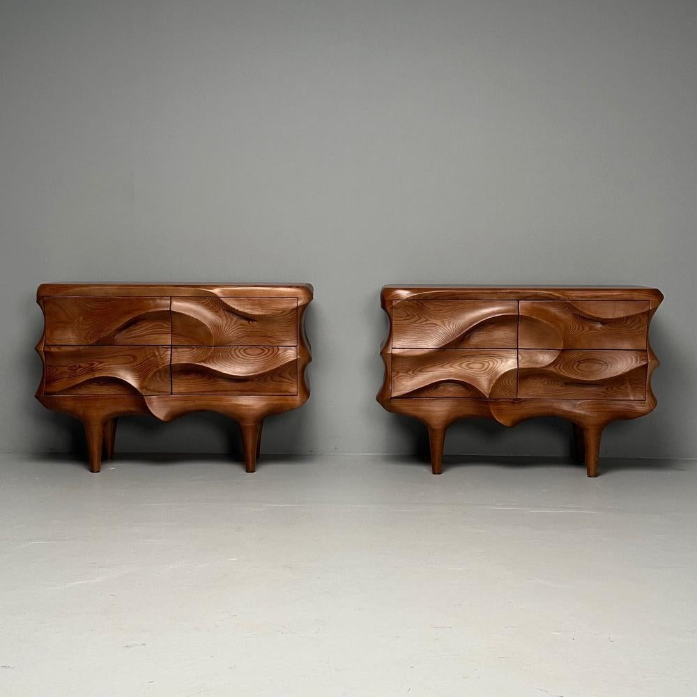 Contemporary, Modern Sculptural Cabinets, Stained Ash Wood, 2024

Pair of contemporary cabinets in sculpted ash wood with a stained walnut finish. These cabinets feature a three dimensional freeform carving throughout the front, sides, and bottom.