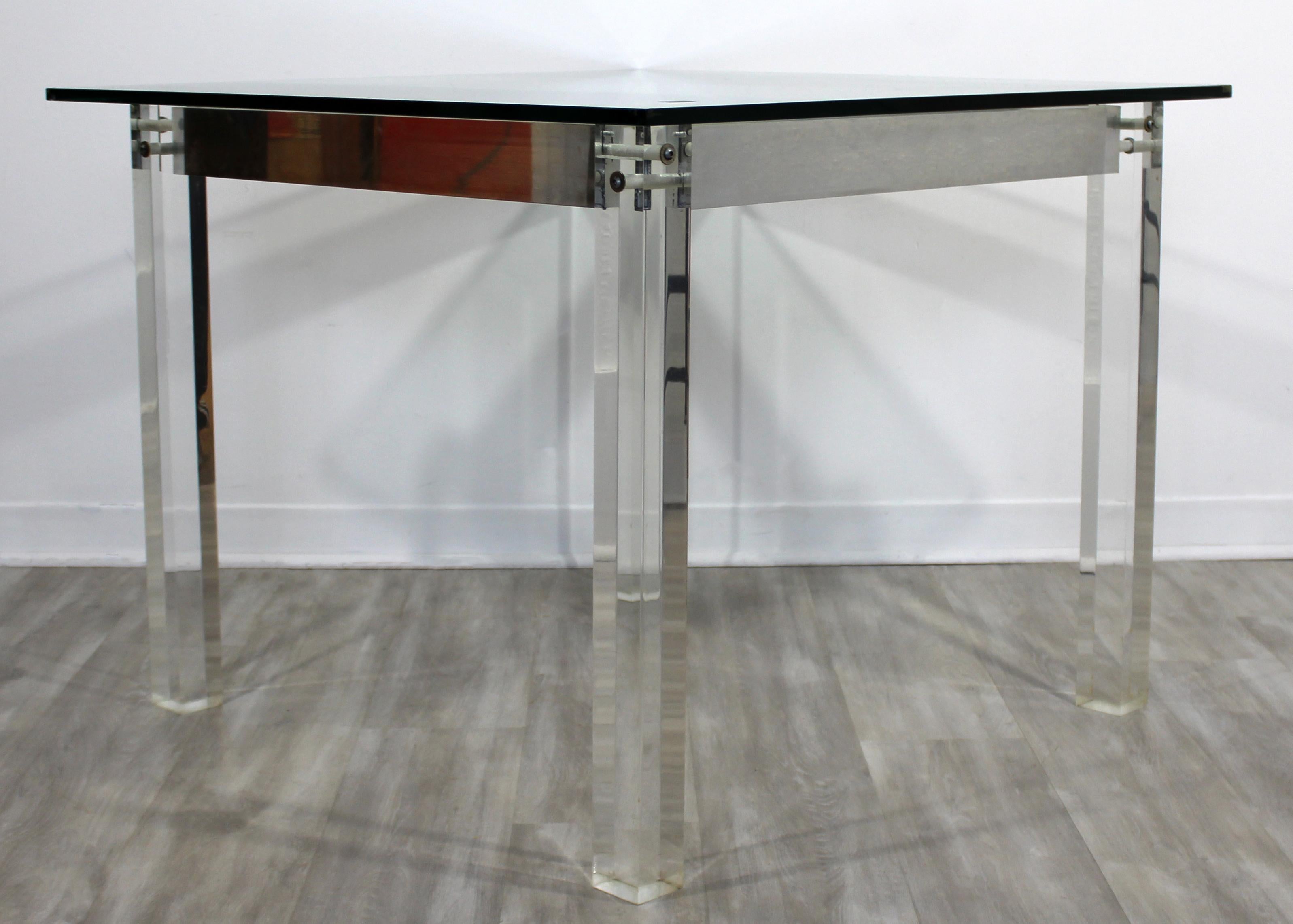 For your consideration is a stunning, square glass topped dinette or game table, on Lucite acrylic legs, circa 1980s. In very good vintage condition. The dimensions are 33