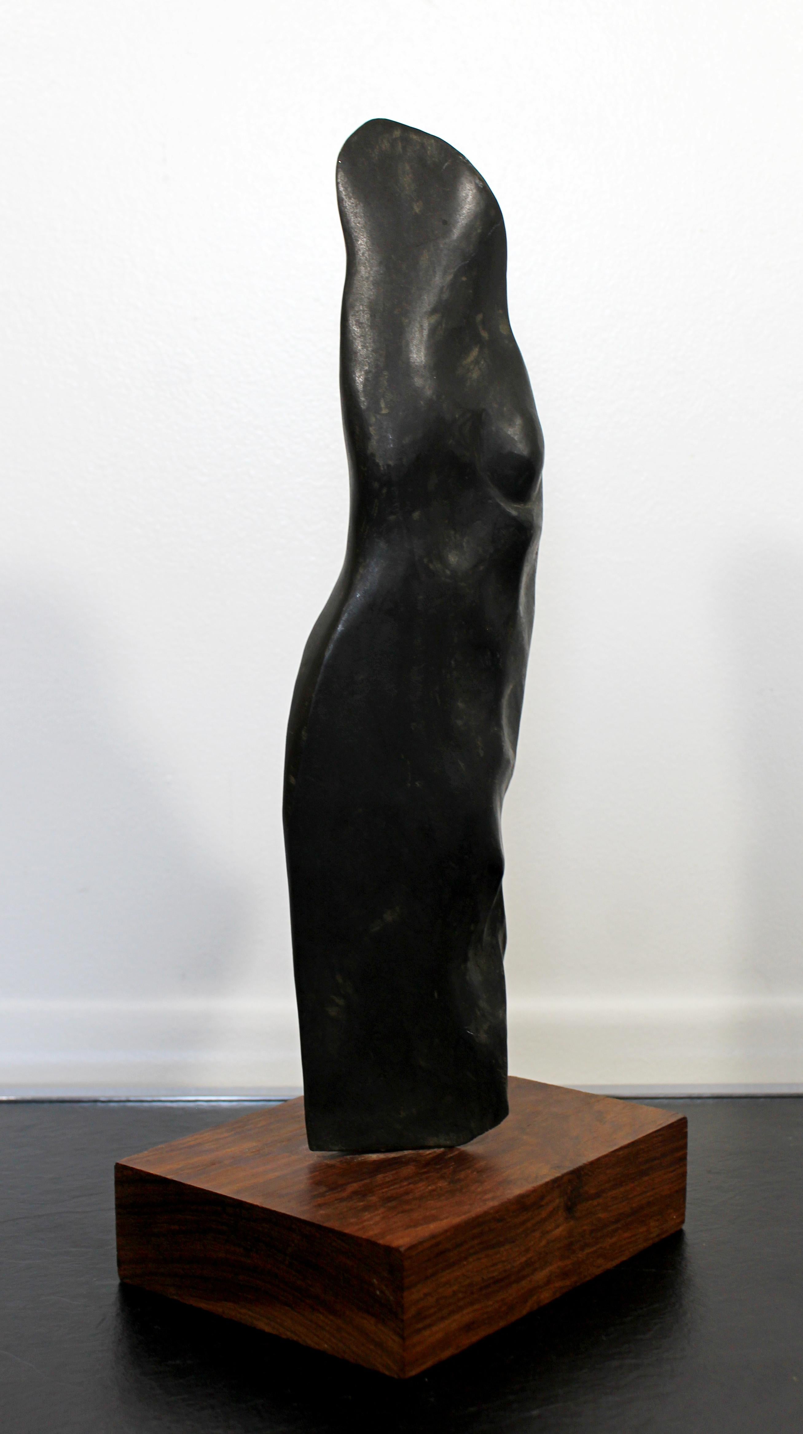 For your consideration is a haunting, abstract stone table sculpture, on a wood base, signed by Leonard Schwartz, entitled 