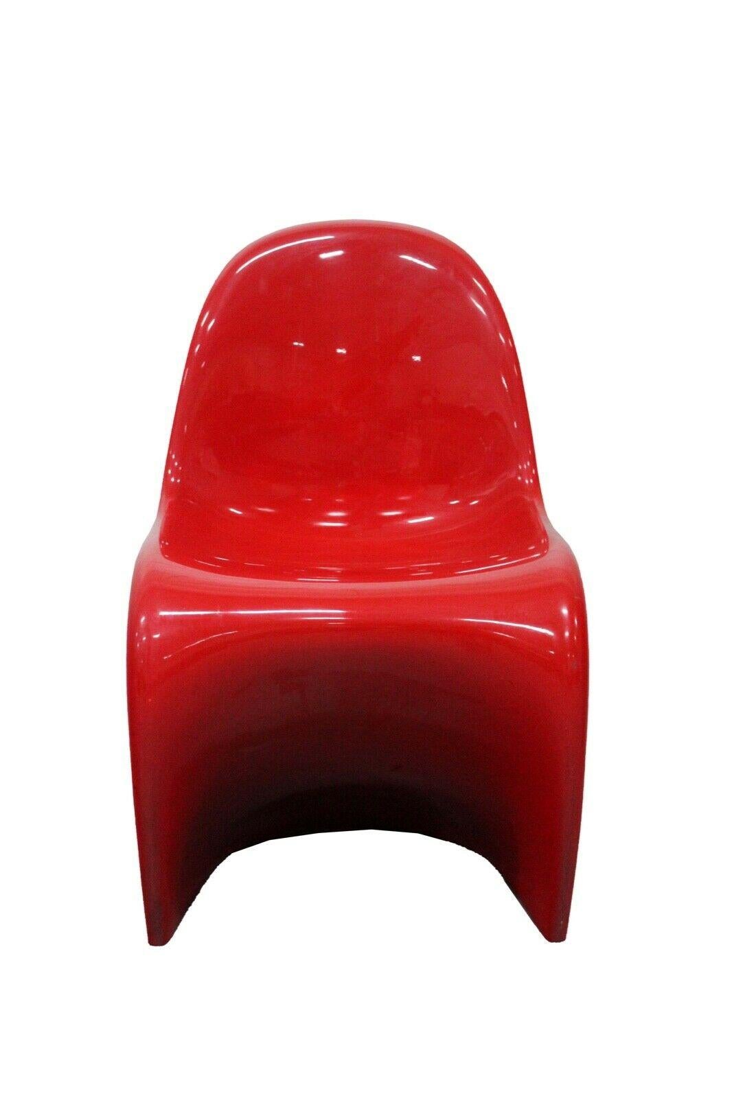 For your consideration is this iconic bright red Vitra stackable chair designed by Verner Panton. Dimensions: 19w x 21d x 32h Seat Height: 18