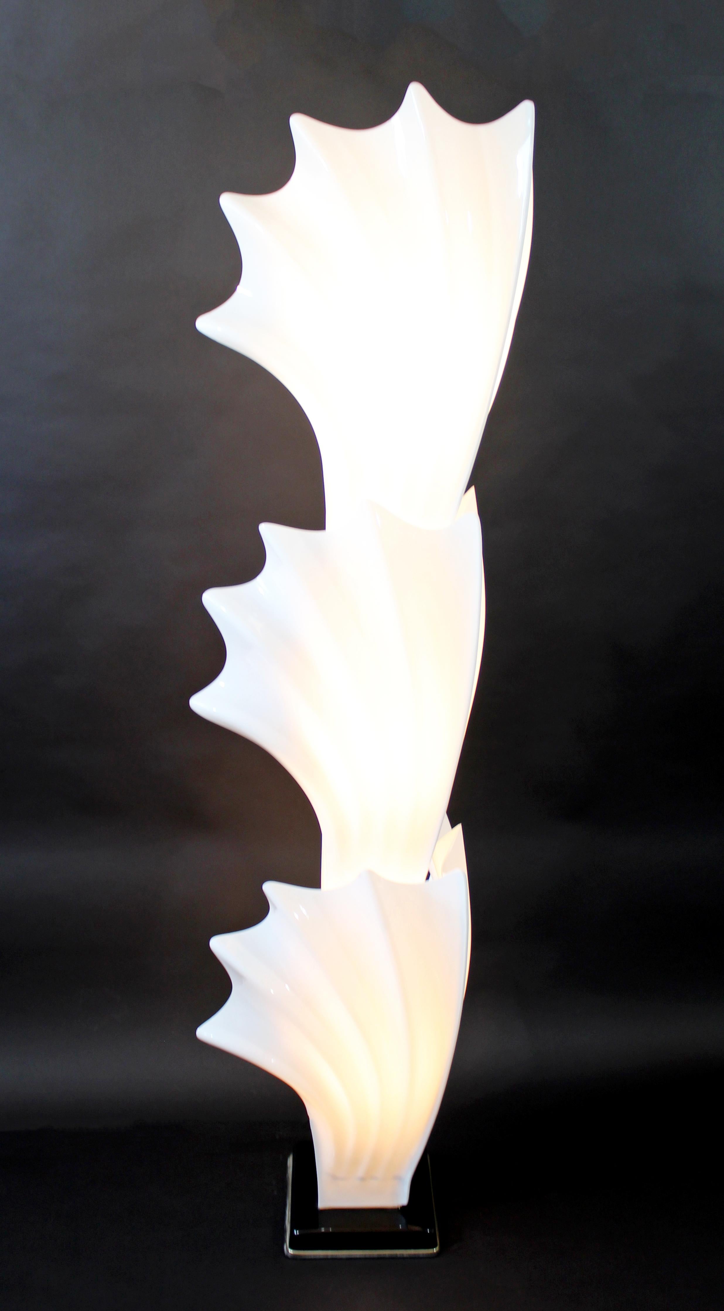 For your consideration is a tall, molded acrylic, shell or leaf shaped floor lamp, by Rougier, circa 1980s. In excellent vintage condition. The dimensions are 20