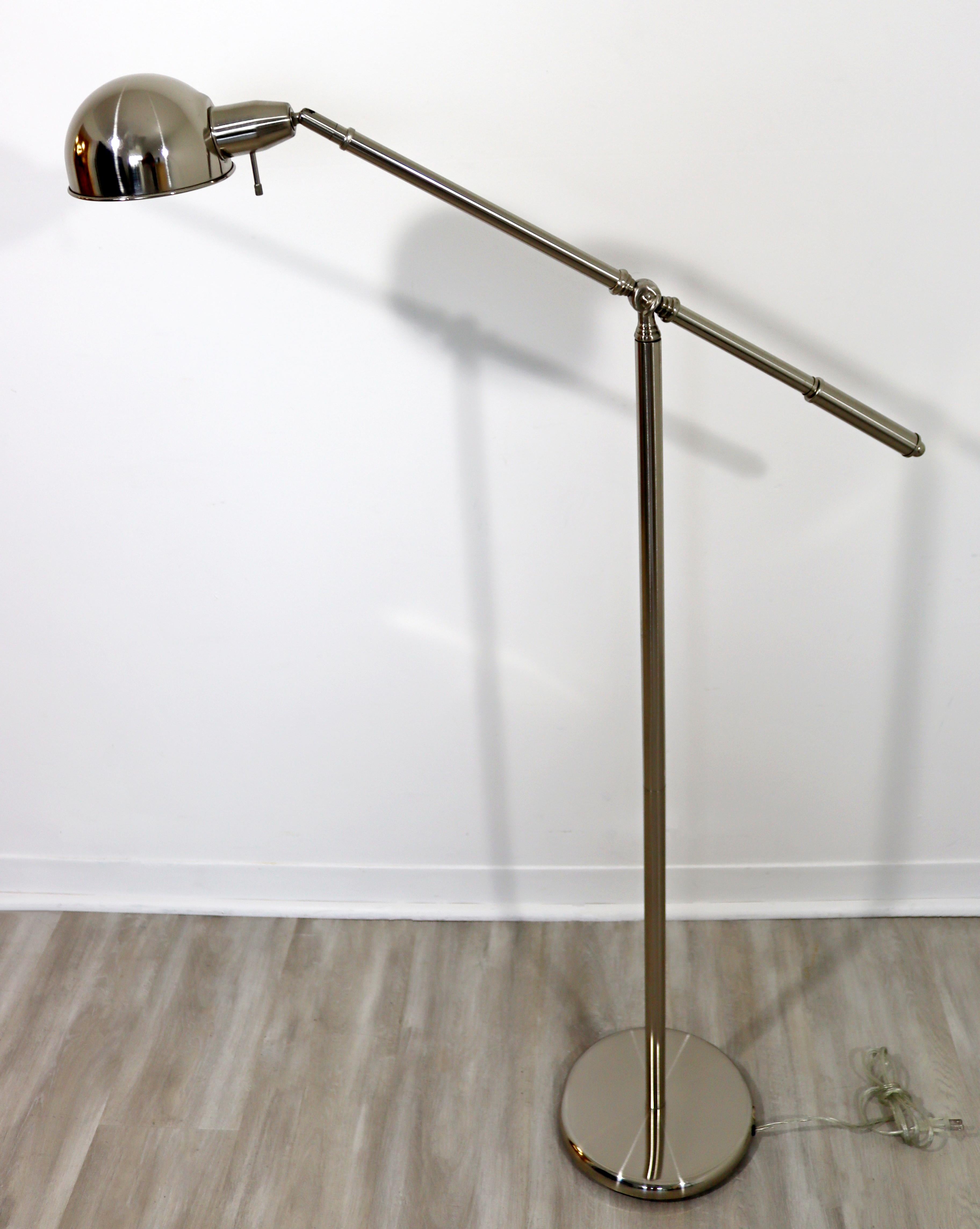For your consideration is a gorgeous, adjustable, articulating reading table lamp, made of aluminum metal. In excellent condition. The dimensions are 34