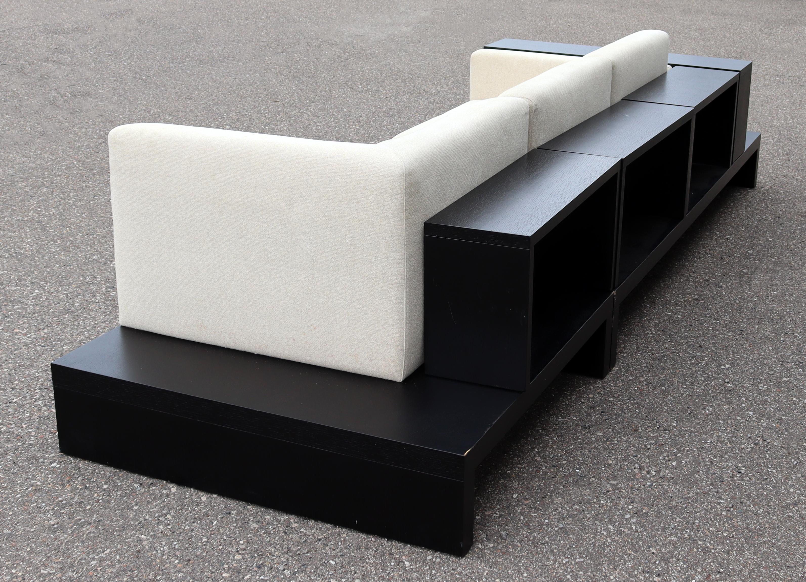 Contemporary Modernist Cream Sofa on Platform with Shelving 5