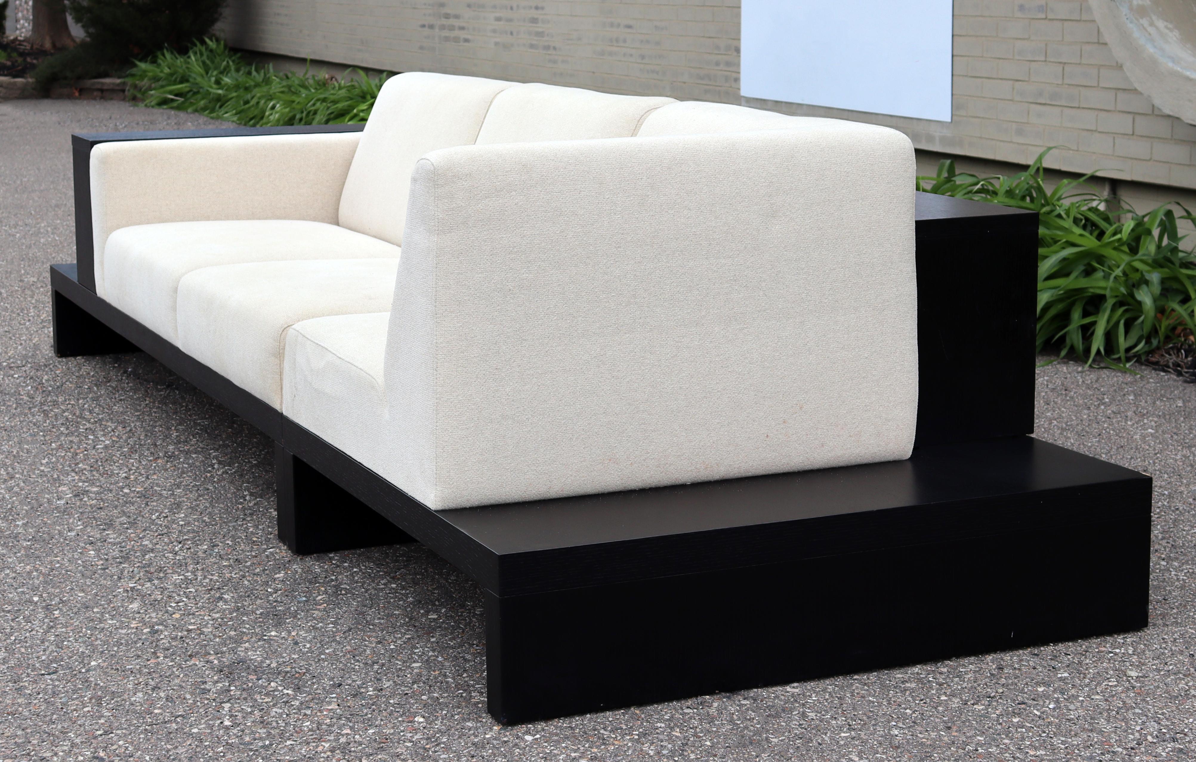 Contemporary Modernist Cream Sofa on Platform with Shelving 7