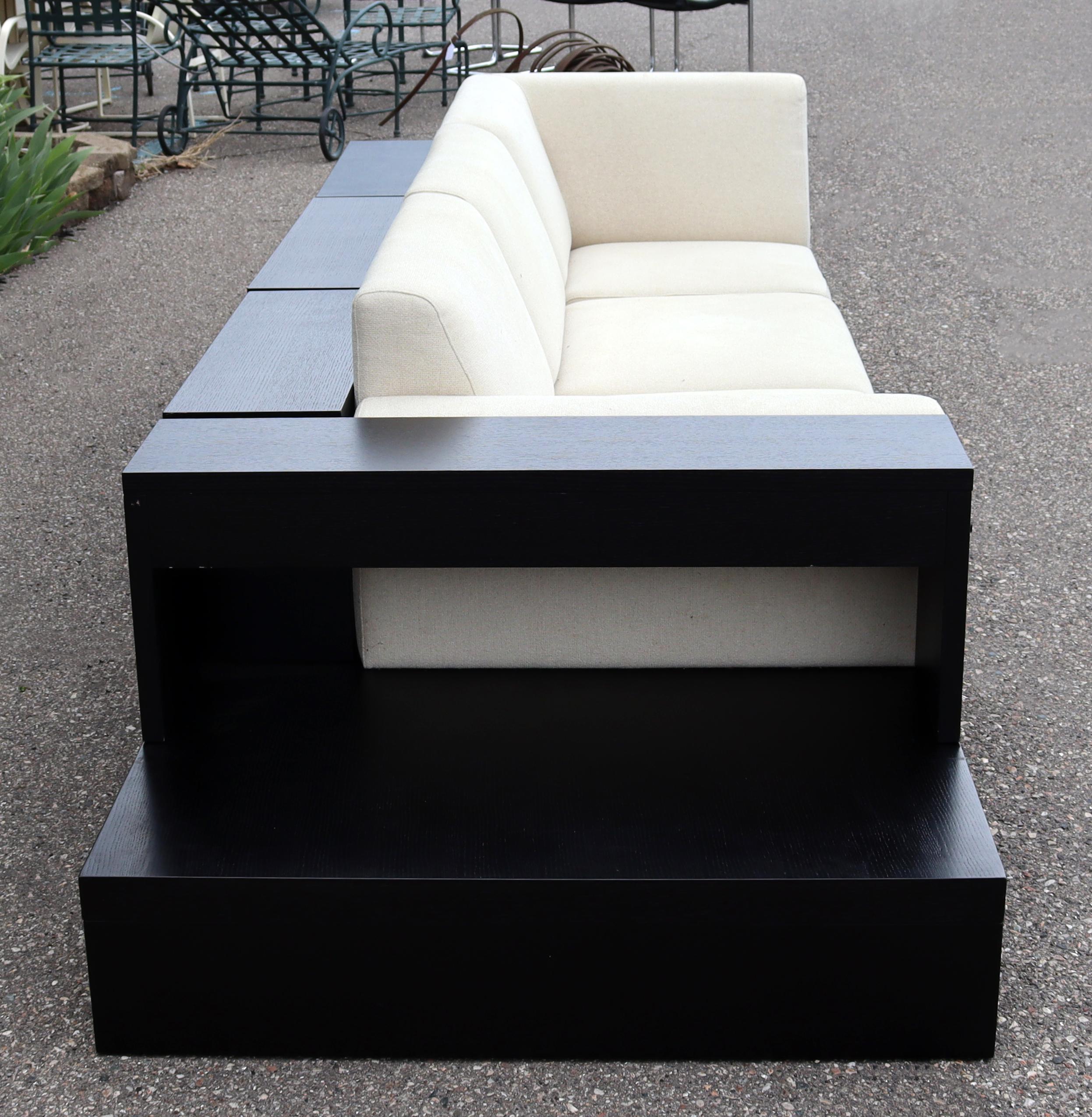 Fabric Contemporary Modernist Cream Sofa on Platform with Shelving