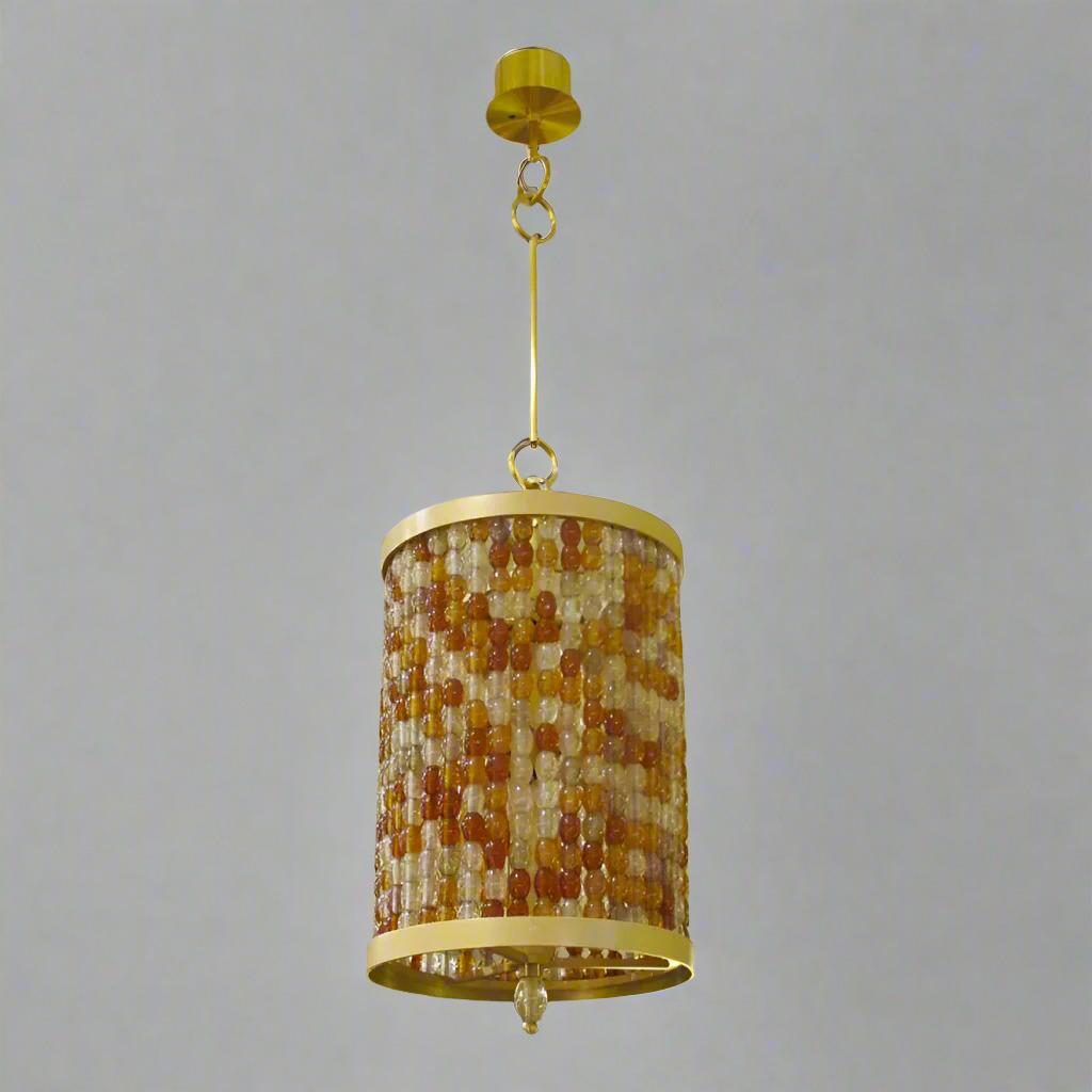 

Una linterna modernista contemporánea diseñada por Roland Wolff. Realizada en bronce dorado con cuentas de cristal de Murano soplado a mano de opalina, topacio, ámbar, rosa y granate. Con dosel y brazo a juego.

Cuerpo de la linterna: A 16,5 , P