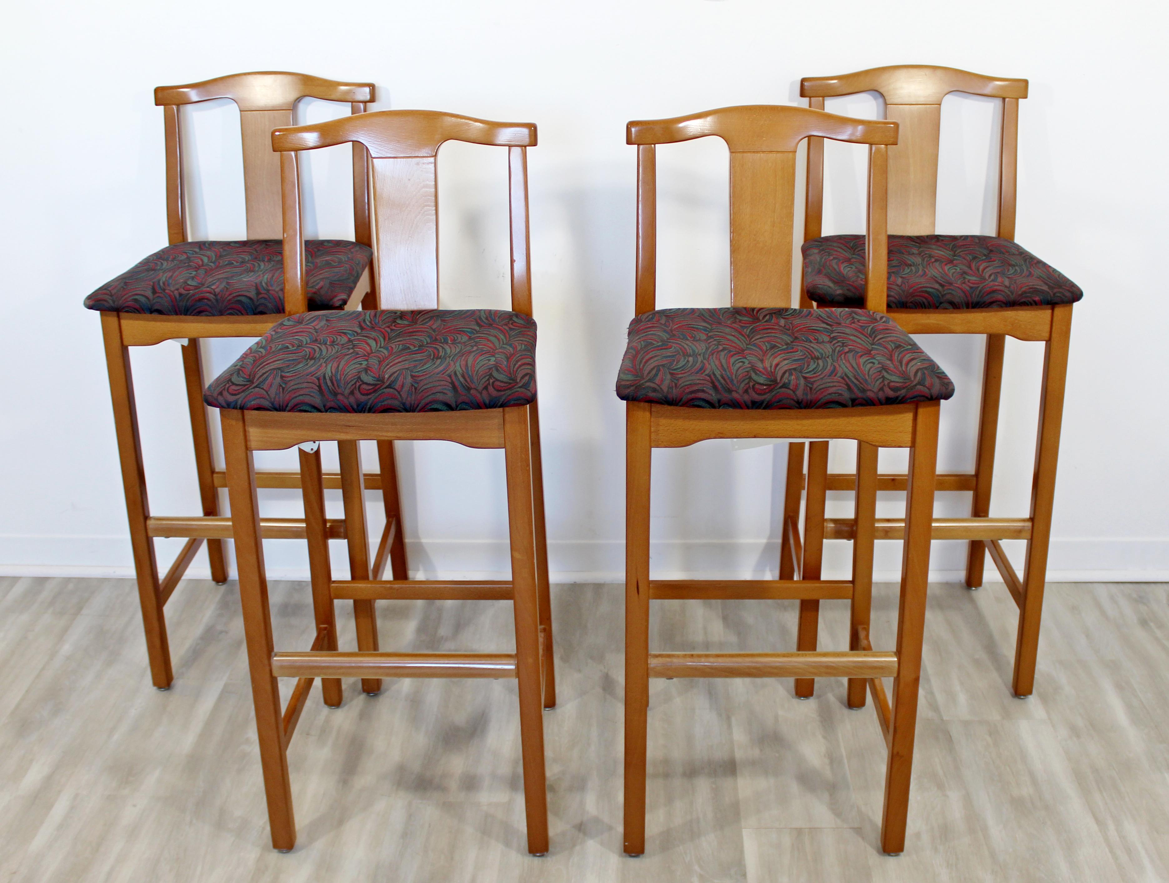 For your consideration is a stupendous set of four counter or bar stools, by Lowenstein, circa 1990s. In excellent condition. The dimensions are 17.5