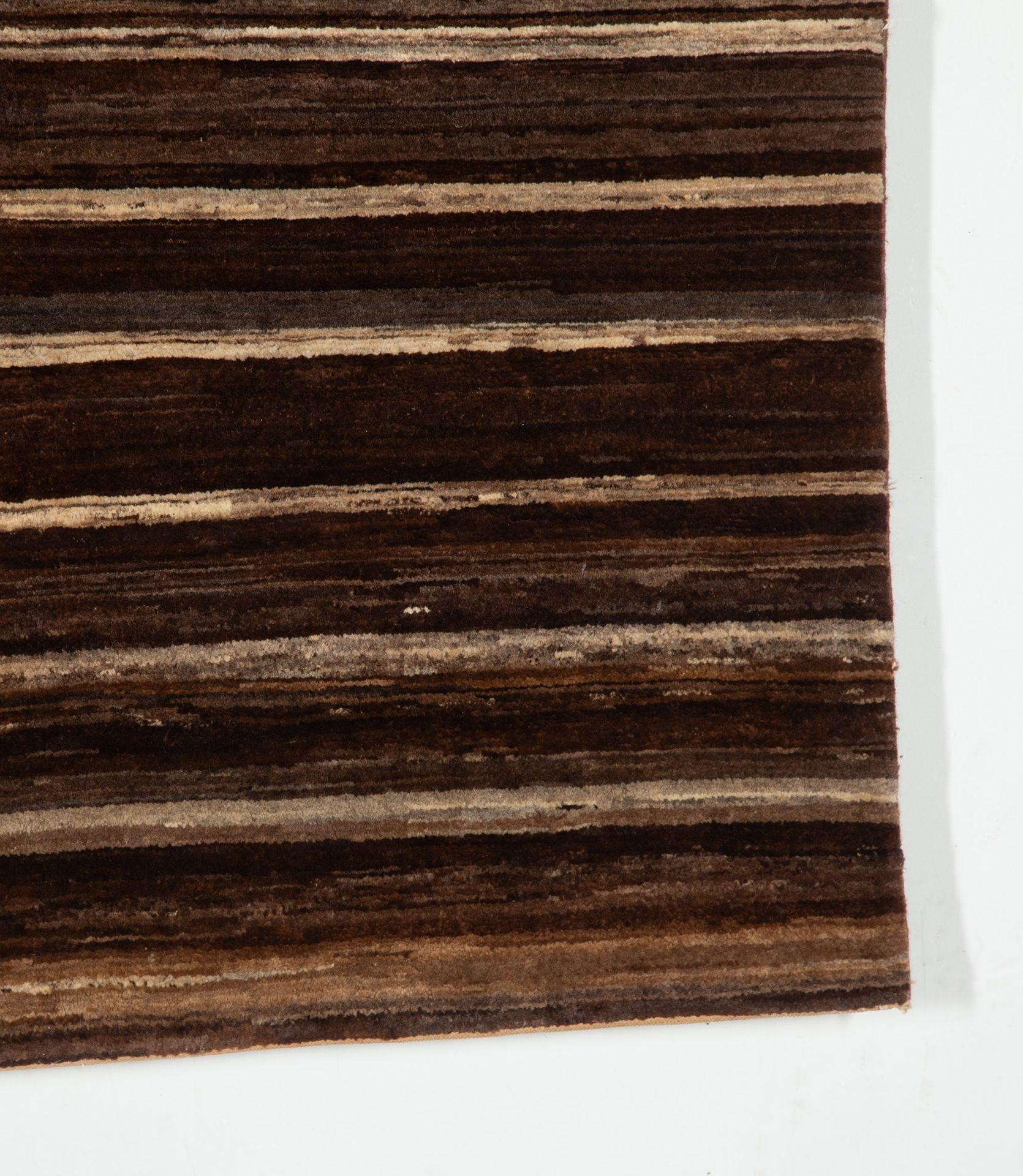 A contemporary Moroccan carpet, hand-knotted in high-grade wool, inspired by highly-sought after Mid-Century Modern Berber weavings, made popular by such designers as Alvar Aalto and Le Corbusier.
The natural abrash – or, colour variation – lent to