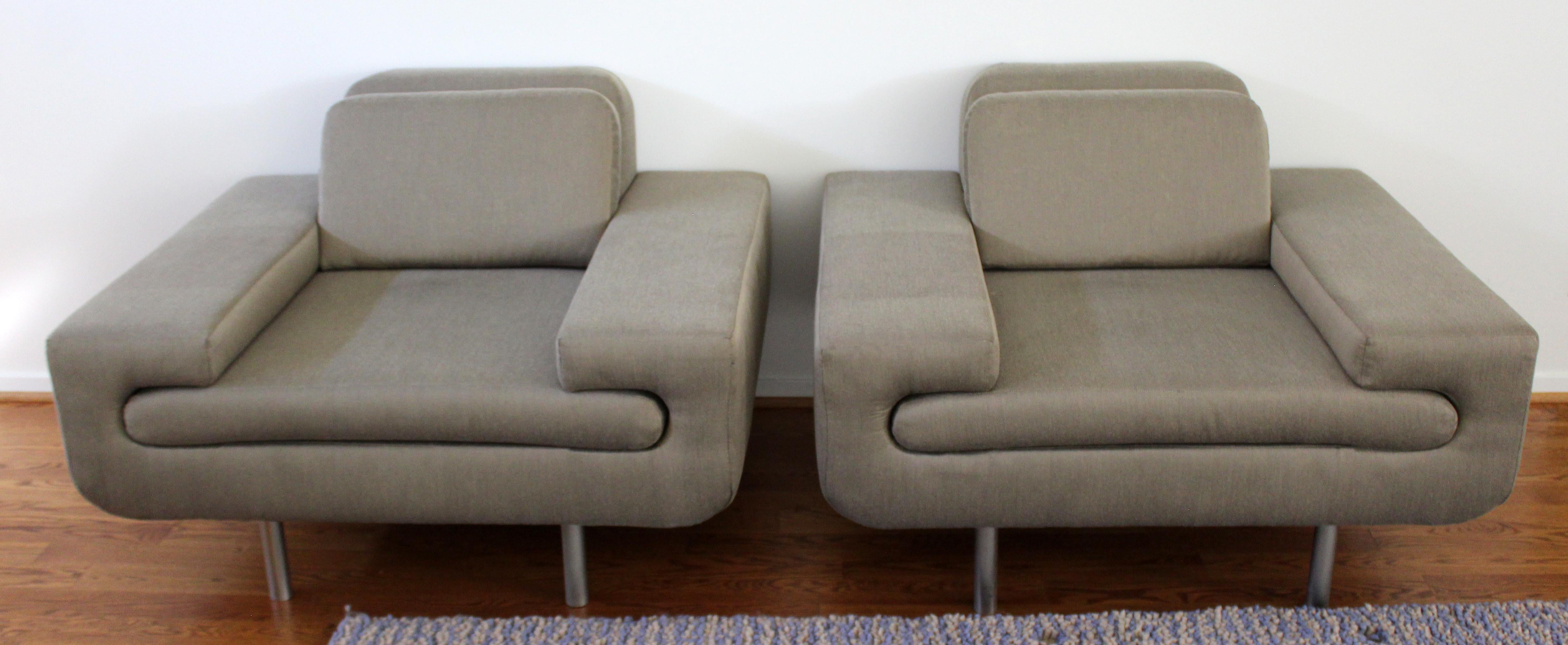 For your consideration is a fantastic pair of lounge armchairs, by Weiman/Preview. In good condition, can be used as is or would be amazing reupholstered, typical wear to the fabric due to use and age. The dimensions of each are 43