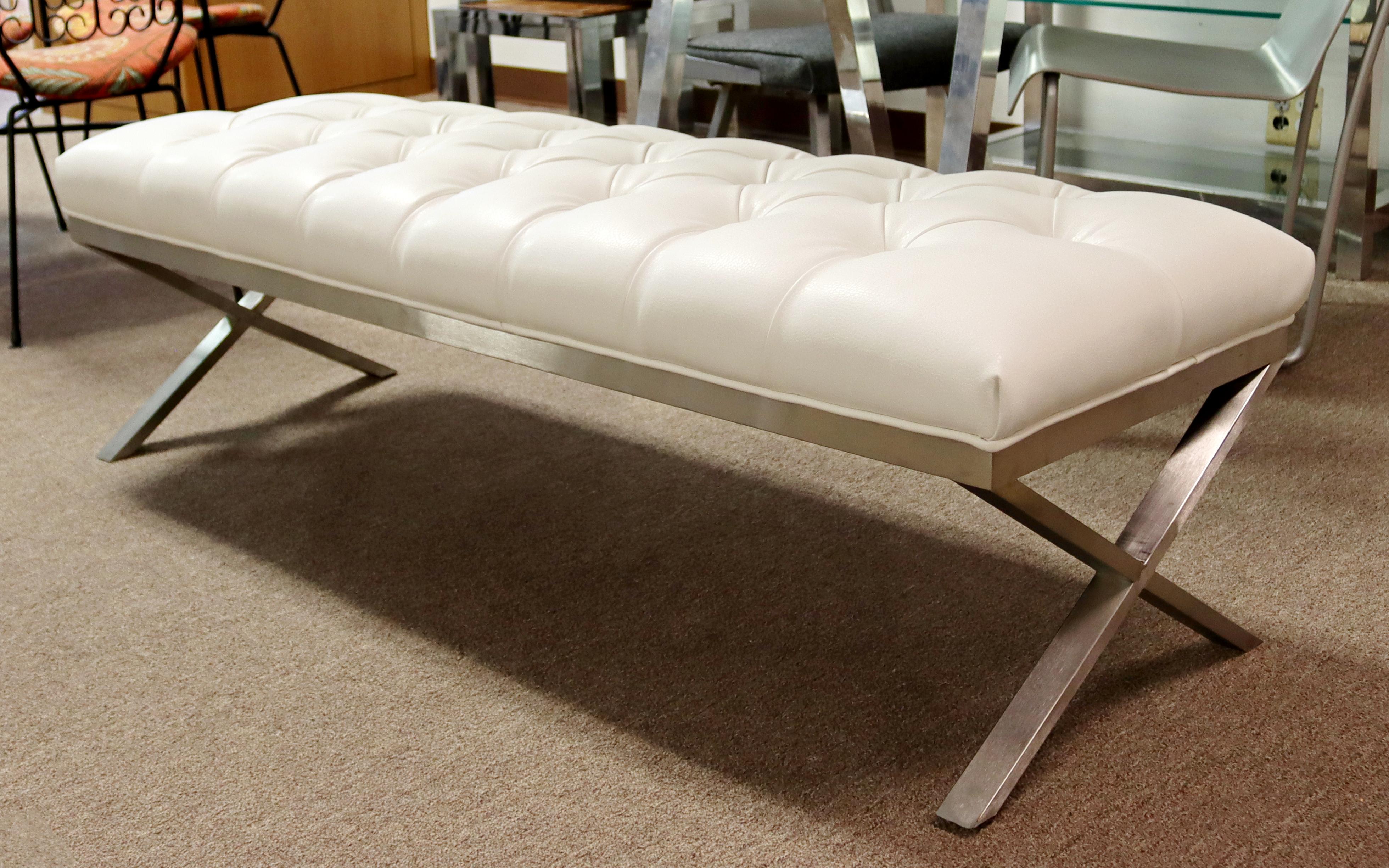 For your consideration is a terrific, tufted vinyl bench, on a chrome base. In excellent condition. The dimensions are 59