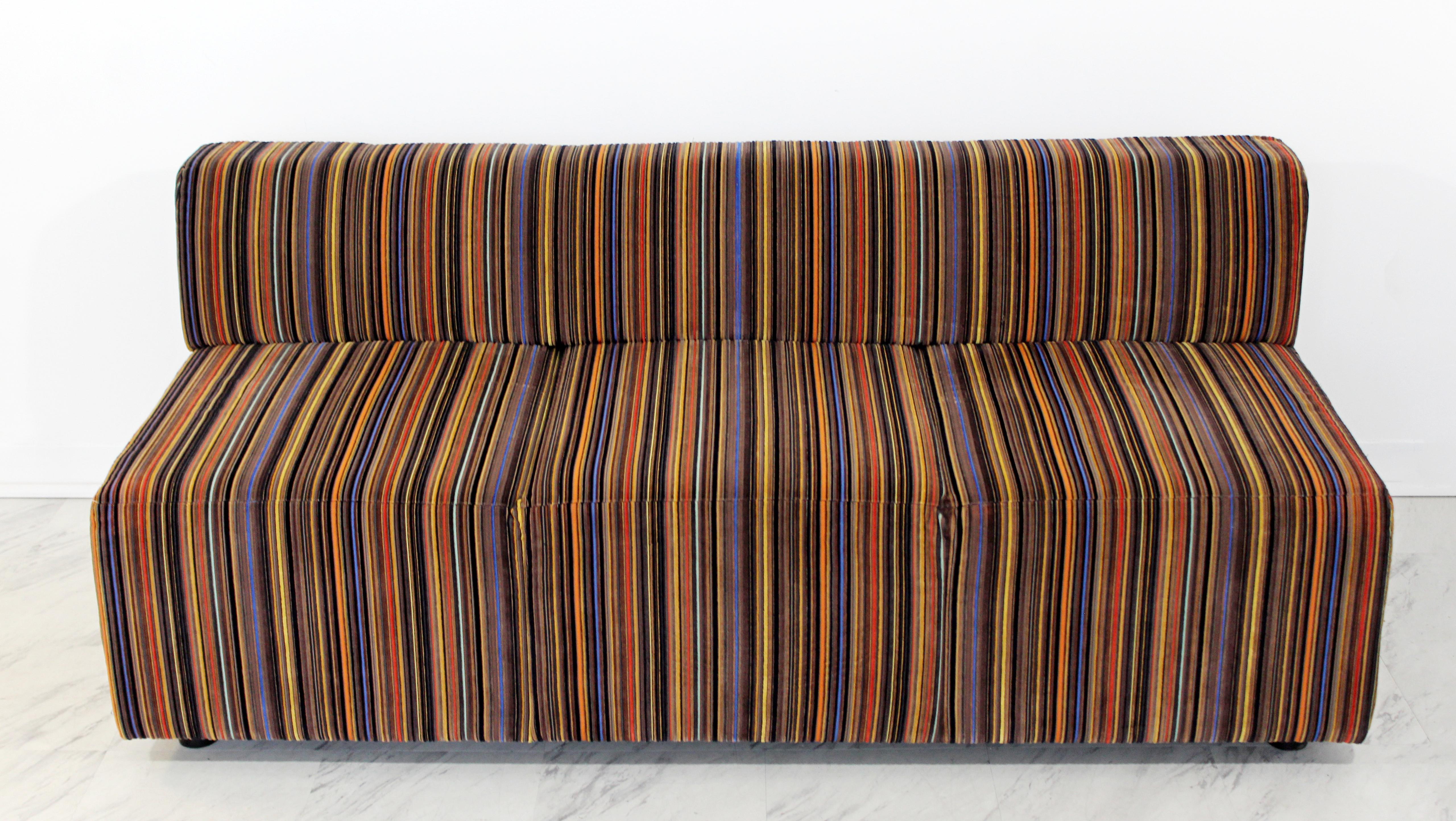 For your consideration is a marvelous, striped sofa or loveseat, by Coalesse, circa 2010. In excellent condition. The dimensions are 66