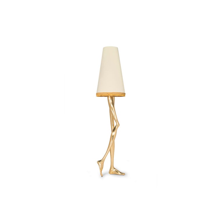 Inspiration: 
Marilyn Monroe, the sexiest Pin-up of the 1950s, inspired a piece of Art & Design. The design of the Monroe Lamp captures the essence of her image and the sensuality of her legs. The lampshade and the gold tassel fringe complement the
