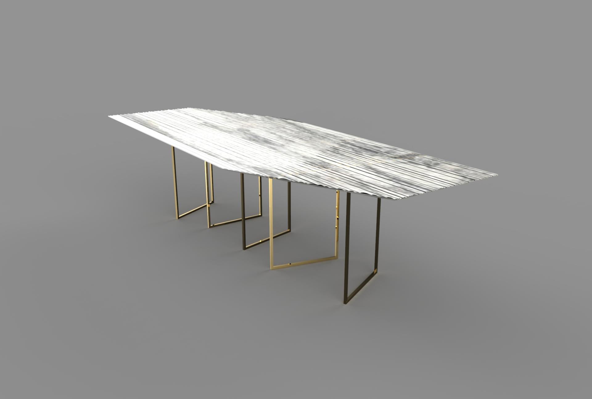 The ‘Moov’ Bespoke table is designed by Stefano Trapani. The hexagonal table top is entirely made in hand cut Carrara marble; the feet are made in gilt bronze and simulate a movement of the marble. The table is fully customizable, by choosing the