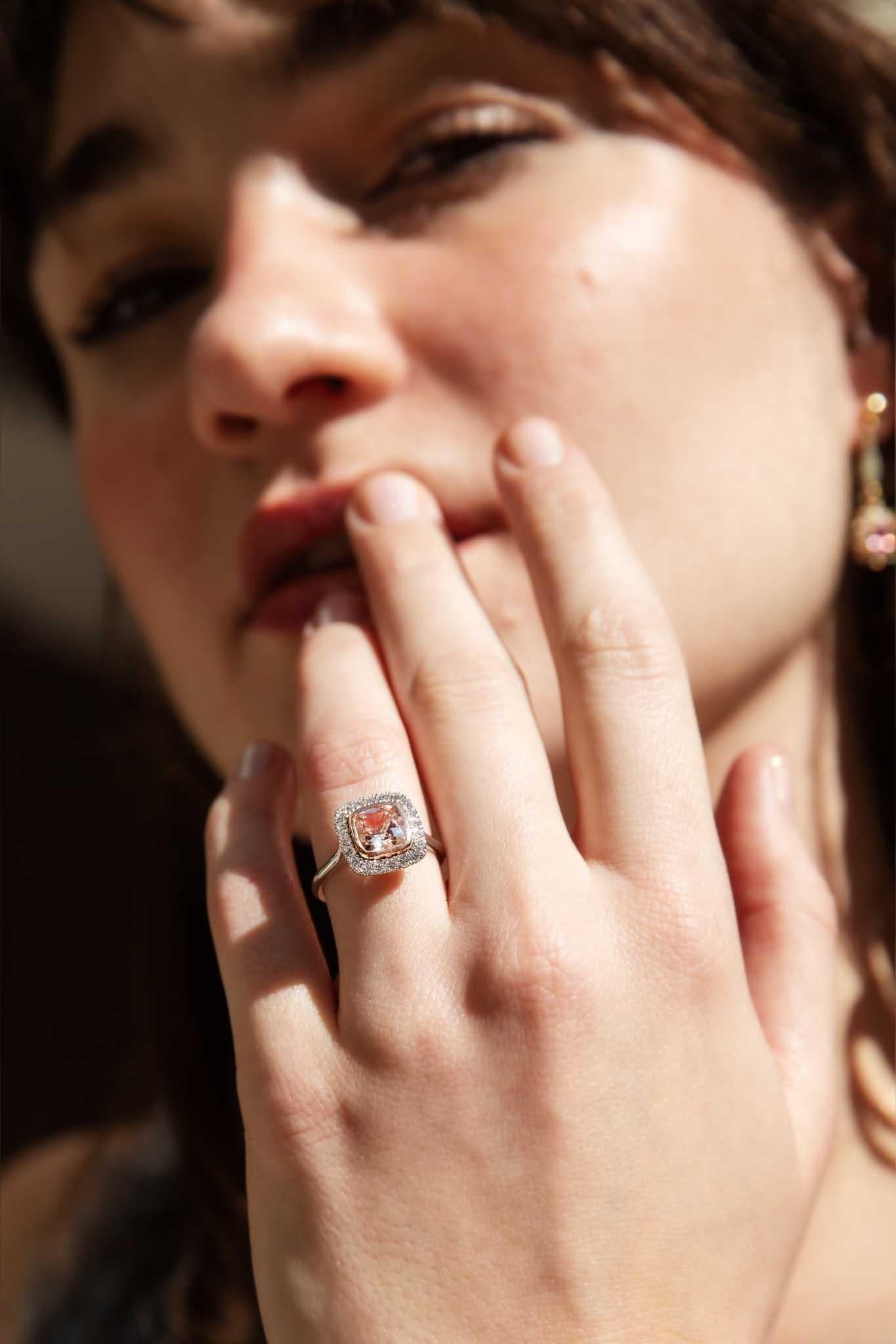 Crafted in 18 carat white gold, our Mirriam Ring is a light-filled jewel.  Her lush latte morganite with the faintest whisper of pink, is framed in a halo of sparkling diamonds.  Perfect for your perfect someone.

The Mirriam Ring Gem Details
The