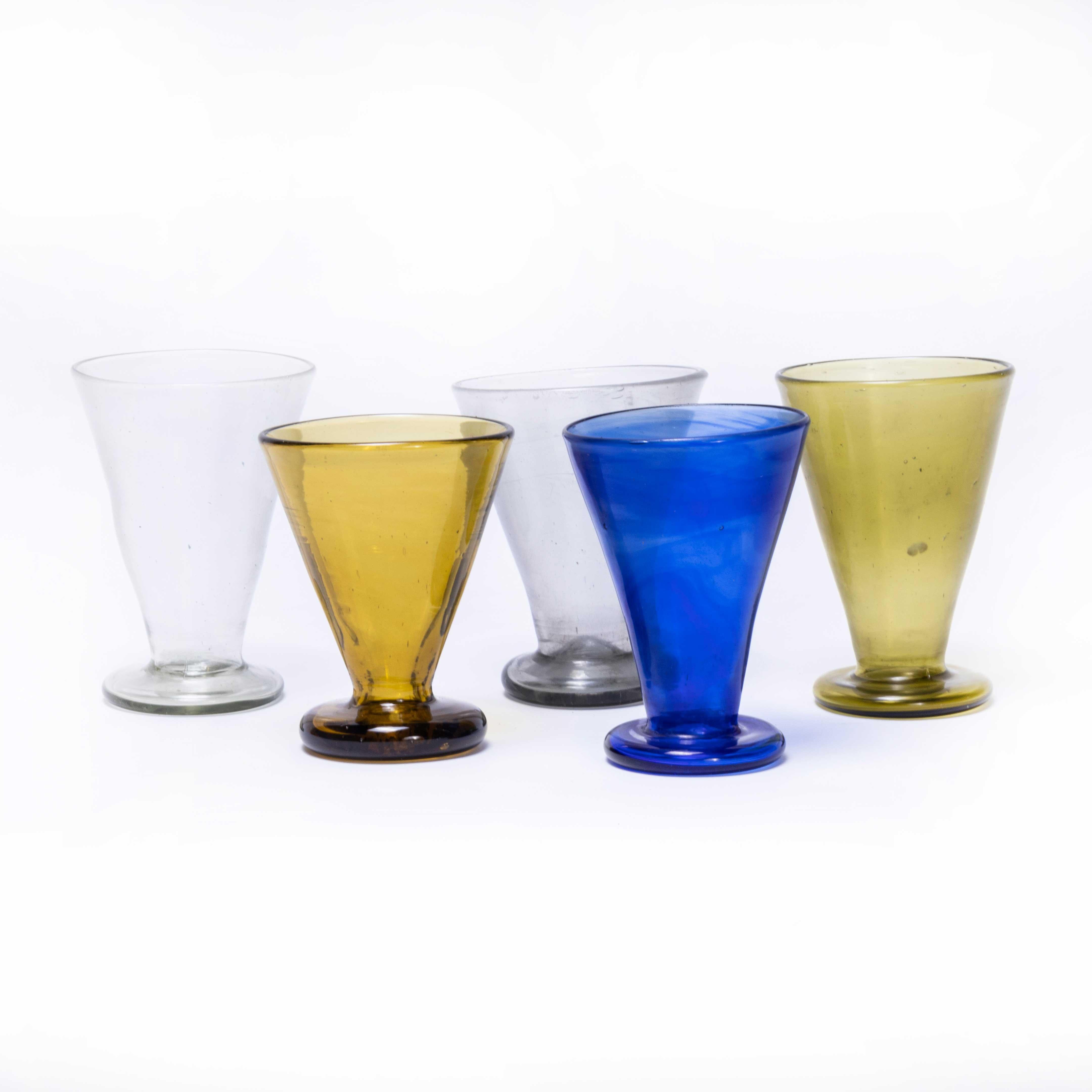 Contemporary Moroccan conical glasses – set of six
Contemporary Moroccan conical glasses – set of six. Hand-made in Morocco. The glass is mouth blown and available in a set of assorted colours as shown. The glass is mouth blown in a wonderful
