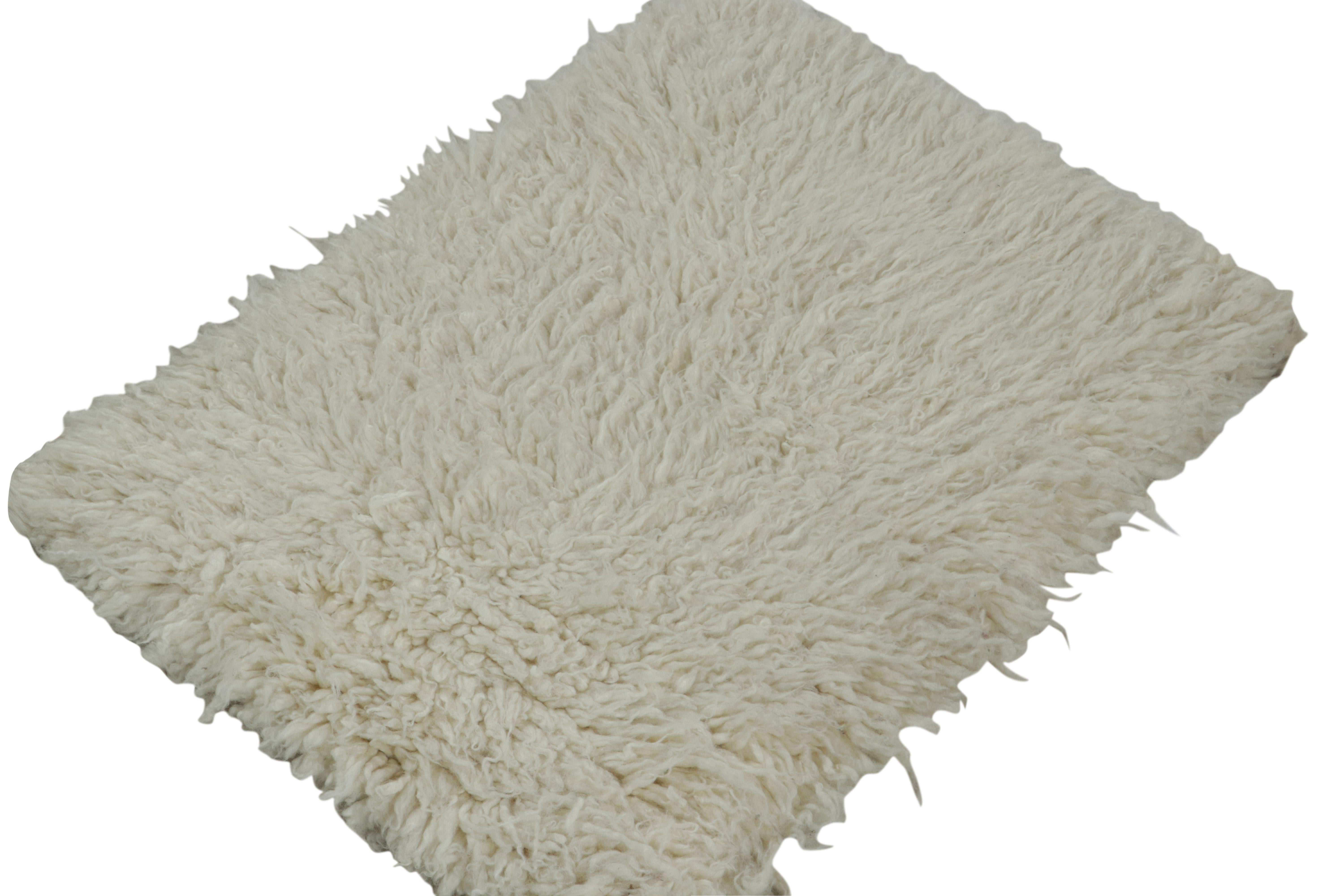 Modern Rug & Kilim's Contemporary Moroccan style rug in Off White Shag Pile For Sale