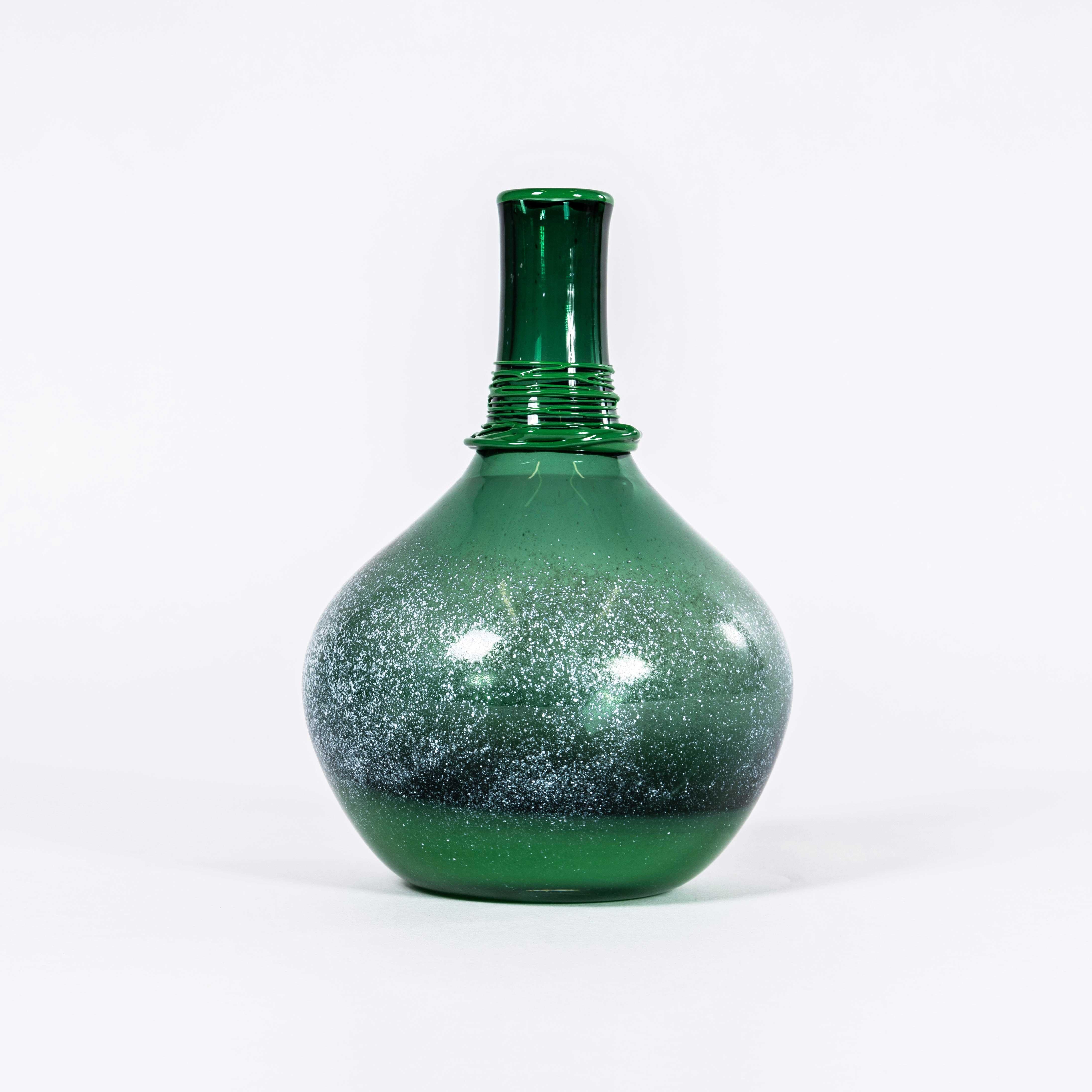 Contemporary Mouthblown Vessel Low Water - Jahday Ford. 

A recent graduate from the Manchester School Of Art specialising in hot blown glass and mould design. Jahday is driven to explore the material of glass and its behaviours with compatible