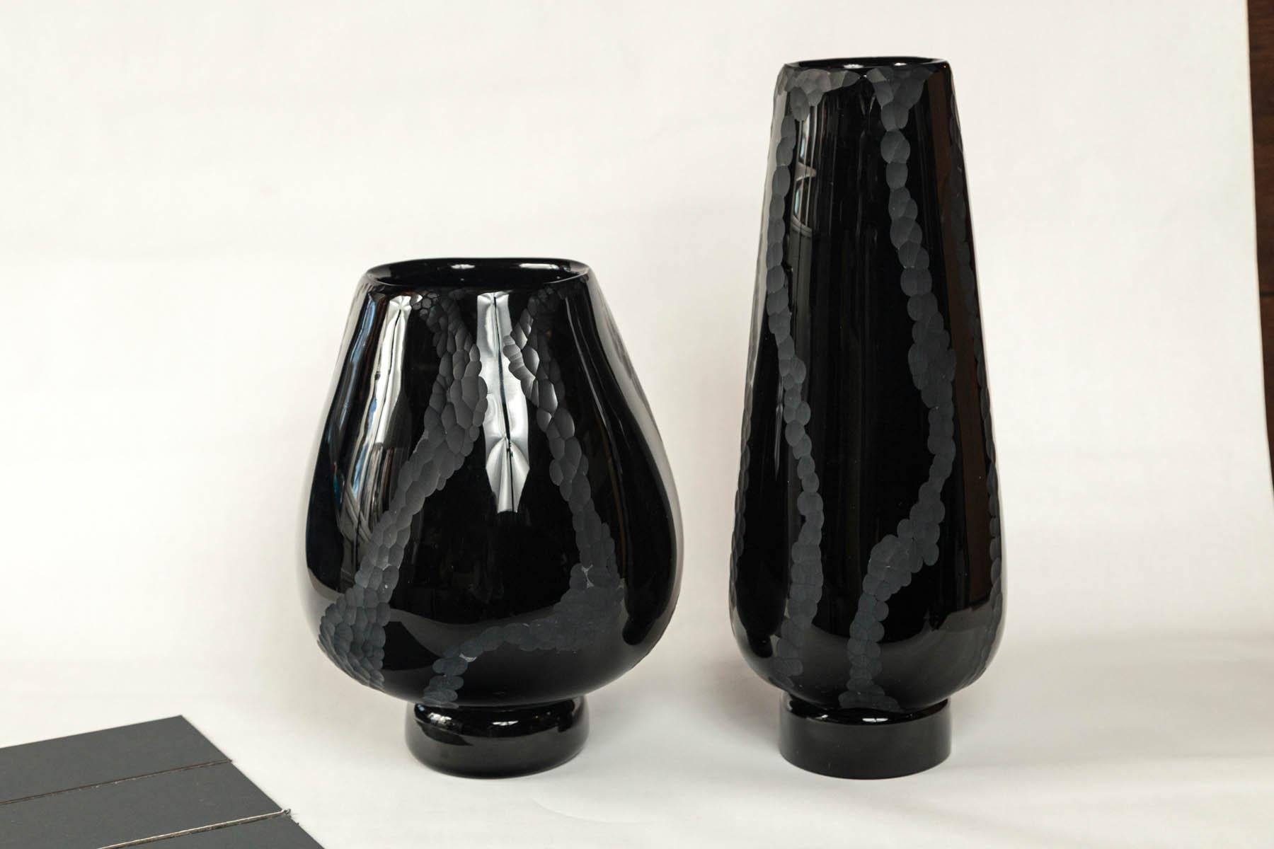  Murano black glass vases, Pauly, Italy. Striking opaque black glass with etched design. Pauly & Co. glassworks was founded in Murano, Italy in 1902, and ceased operation in 2016. Signed: Nostos 2007. Sold individually.