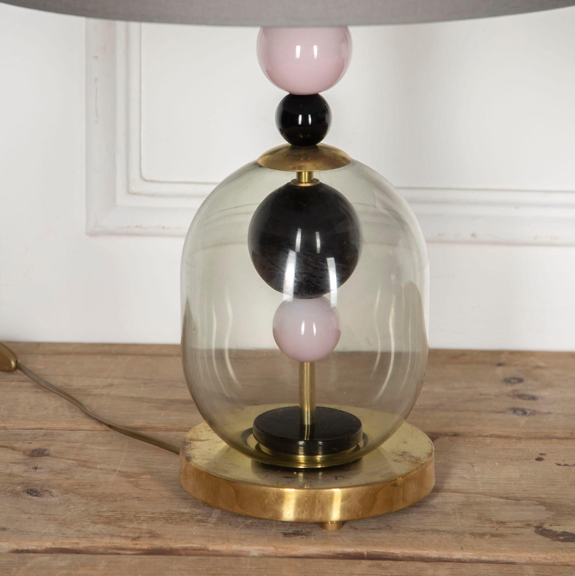 Beautiful contemporary designer table lamps from Murano, Italy.
With pink glass balls inside the transparent domes.
These lamps will make for very elegant additions to a living room!
This item has passed PAT testing according to UK standards.