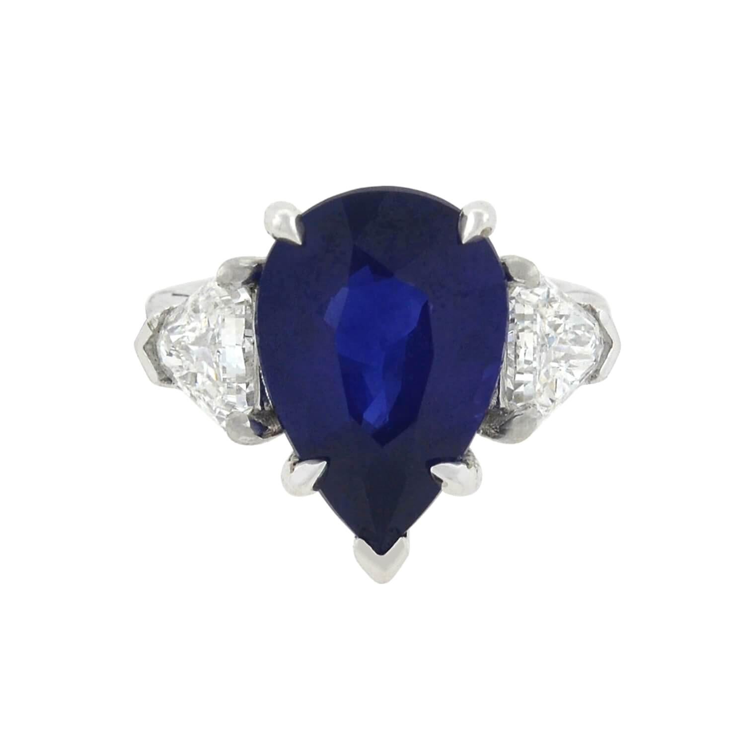 Contemporary Natural 6.05 Carat Pear Shaped Sapphire and Diamond Ring