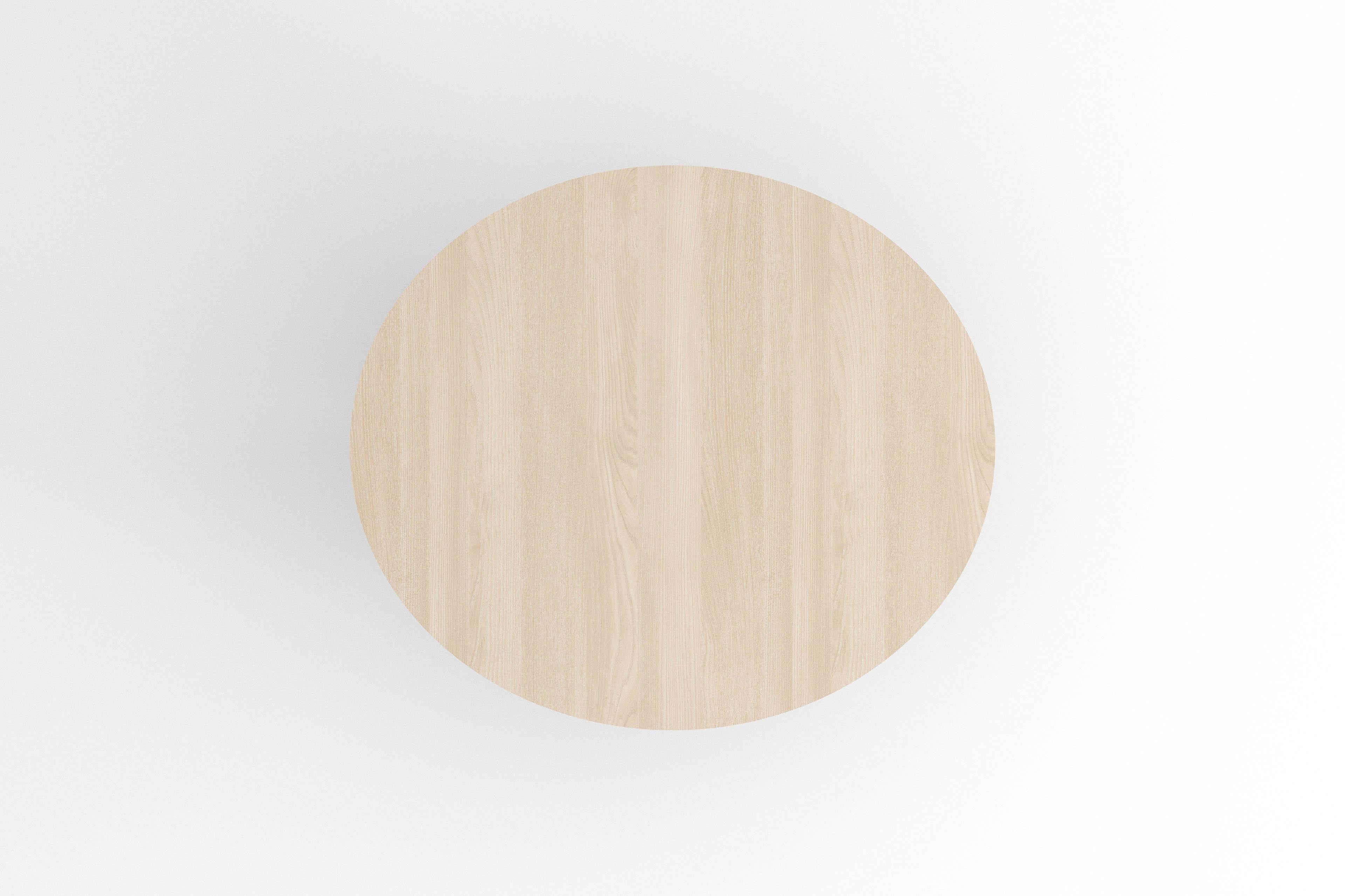 Chamfered Contemporary round dining table, natural ash wood, shifting disc, Belgian design For Sale