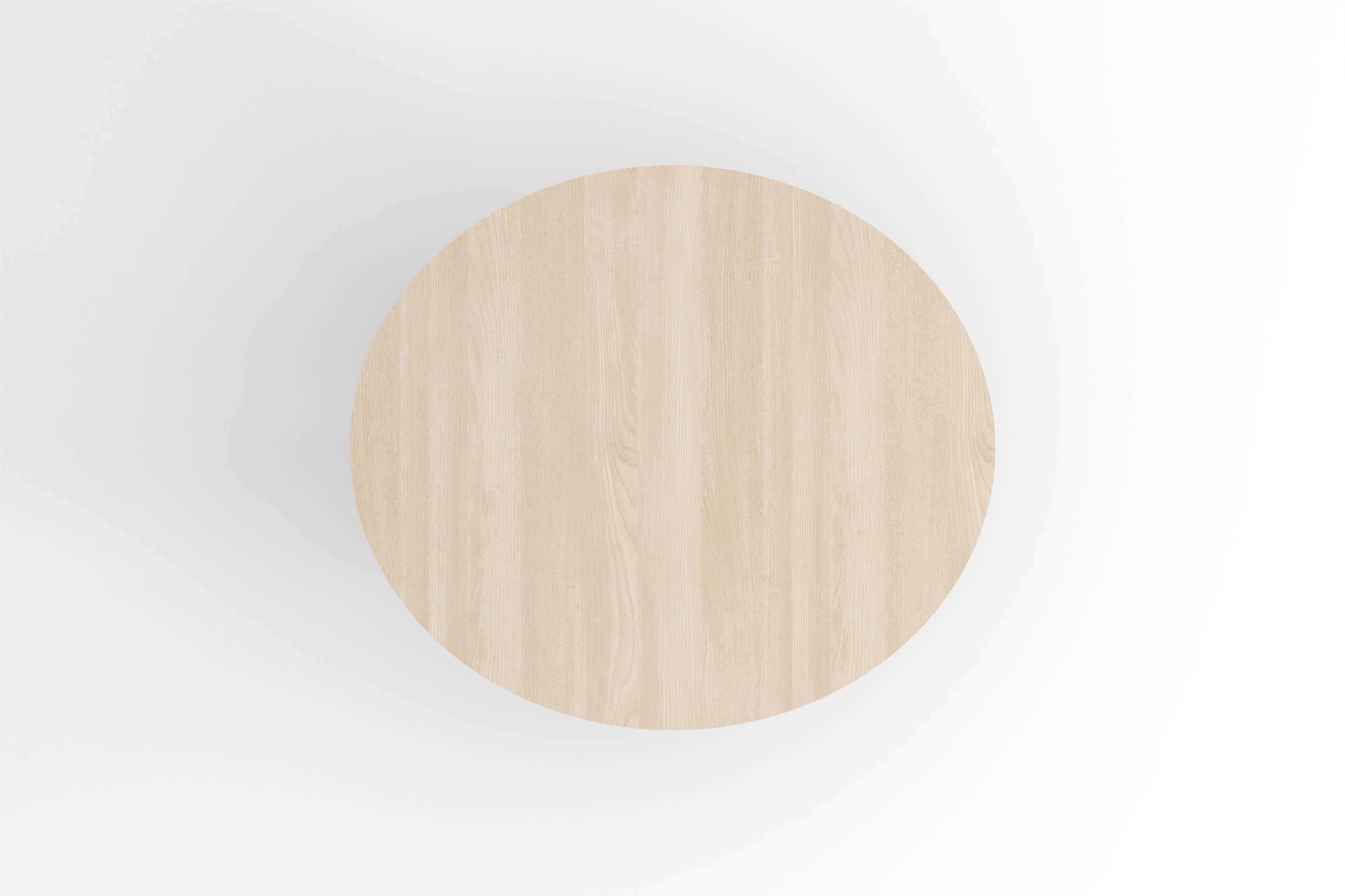 Chamfered Contemporary round dining table, natural ash wood, central leg, Belgian design For Sale
