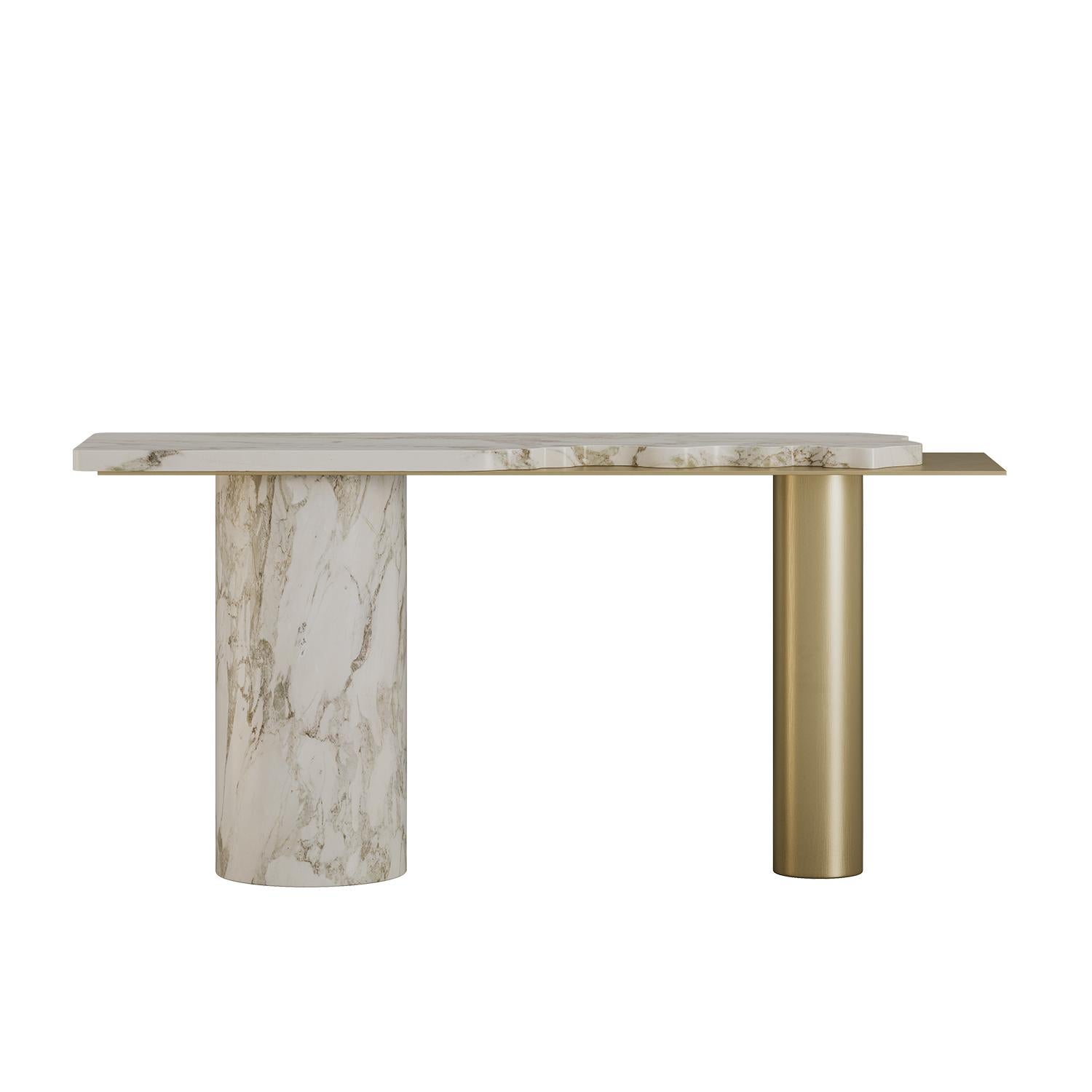 Uno studio sull'equilibrio e sulla materialità, la console Naya combina la bellezza senza tempo della pietra con il calore dei metalli. La composizione asimmetrica crea una presenza tranquilla ma di grande impatto. Sottile, scultoreo e progettato
