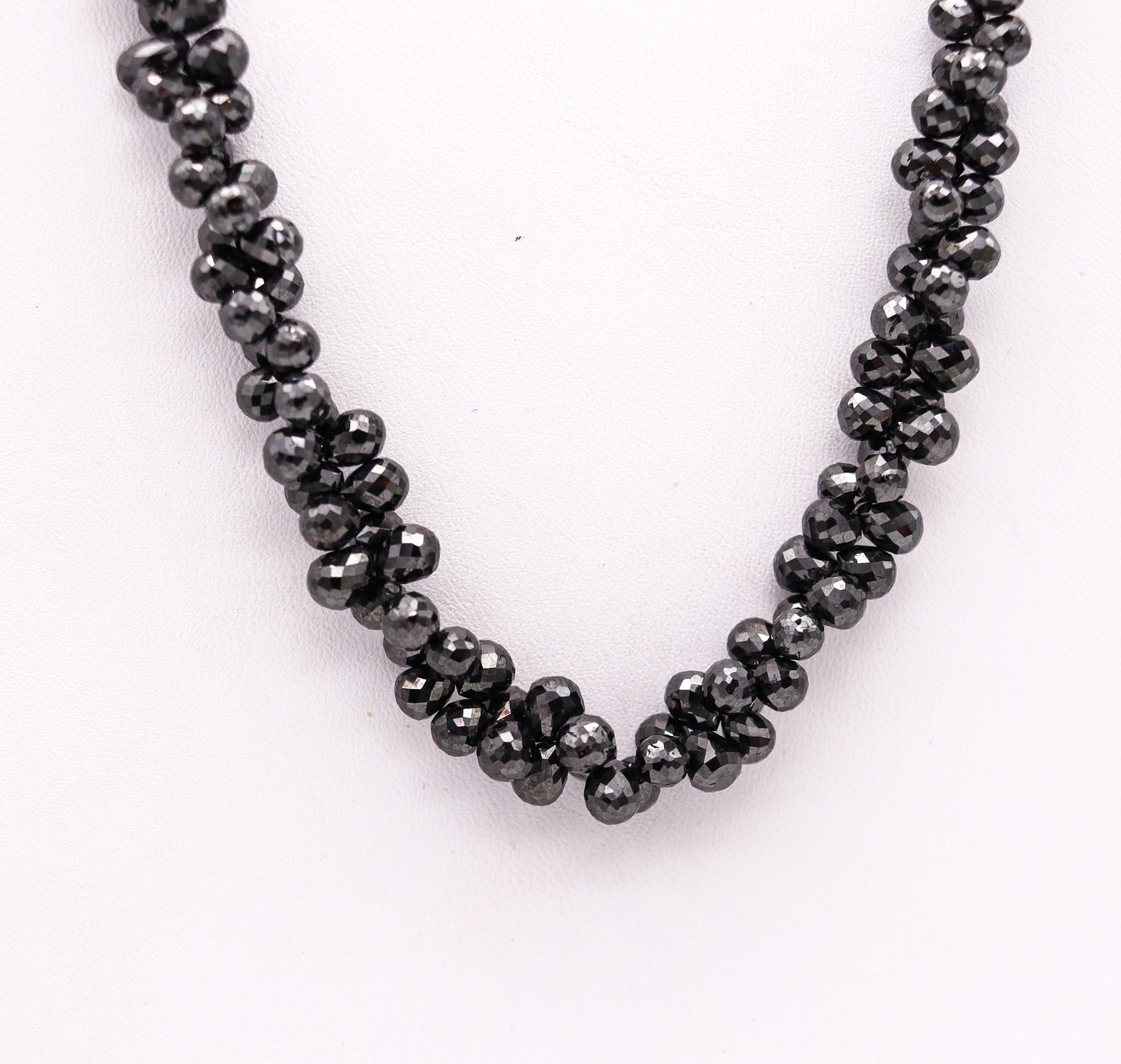 Modern necklace with black diamonds briolettes.

Very elegant and sleek contemporary necklace, created as a cascade of diamonds. Embellished with a great assortment of two hundred thirty eight graduated briolette cuts of black diamonds and