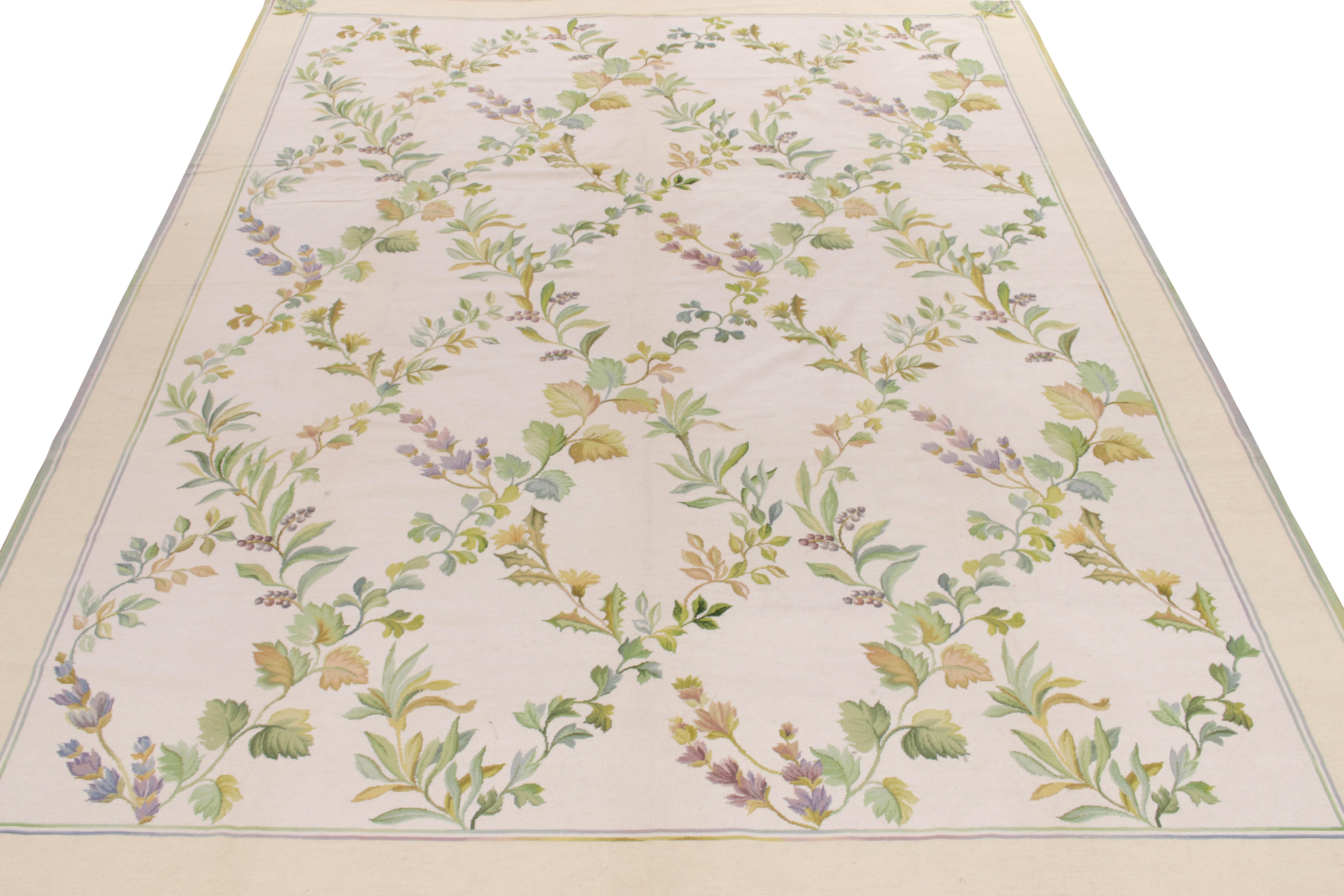 Celebrating the techniques in rug weaving, this 9x12 contemporary scale is an ode to the coveted needlepoint style where alluring florals embrace the scale in green, golden and lilac hues on a soft backdrop for a more transitional take in this
