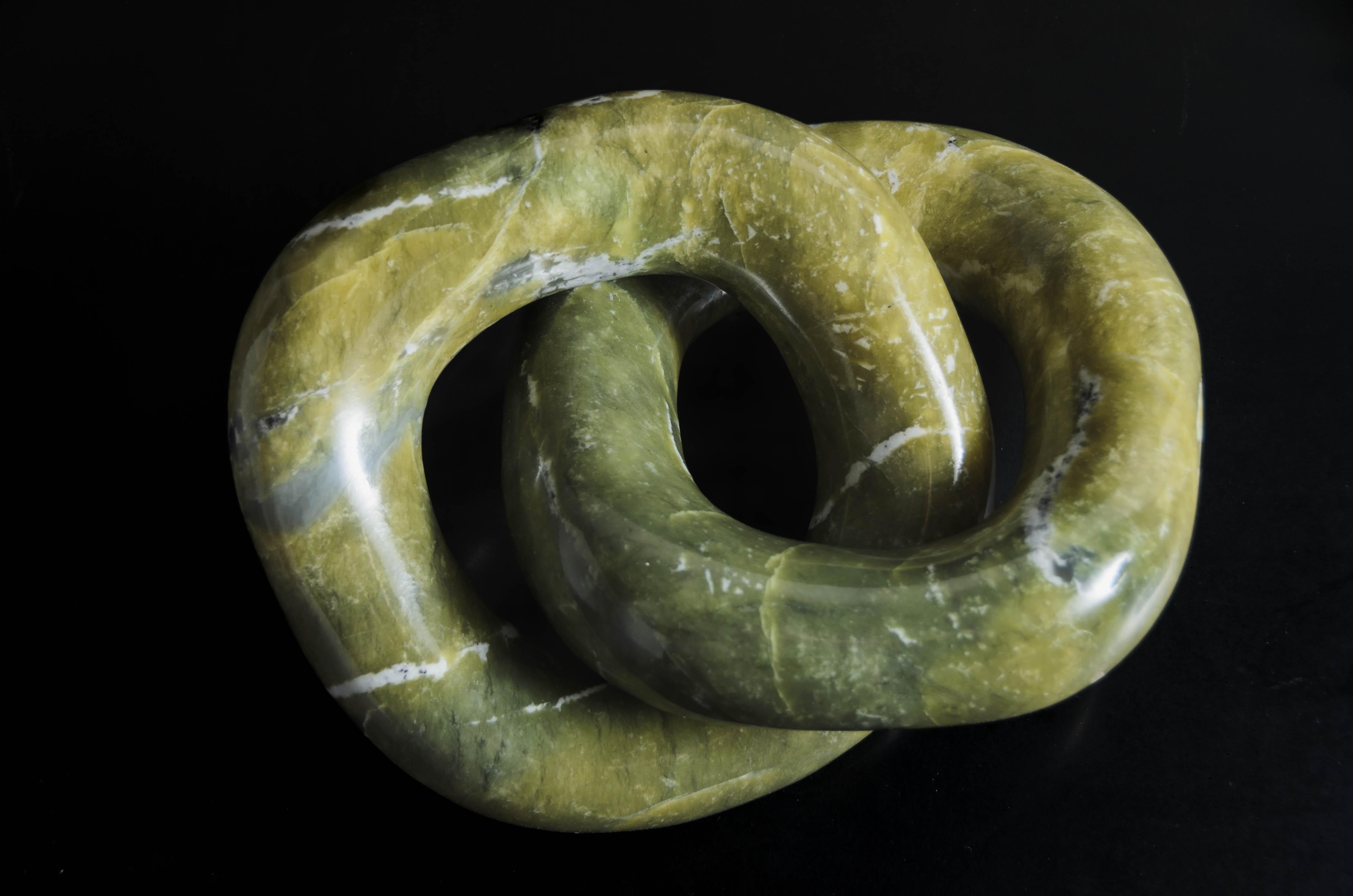 Double Ring Link Sculpture 
Nephrite Jade
Hand Carved
Limited Edition
Contemporary
JADE LINK LABELED: JL09 

Please note: Each individual jade vary in shapes and color please inquire for more information. 

Known as the “Stone of Heaven,”